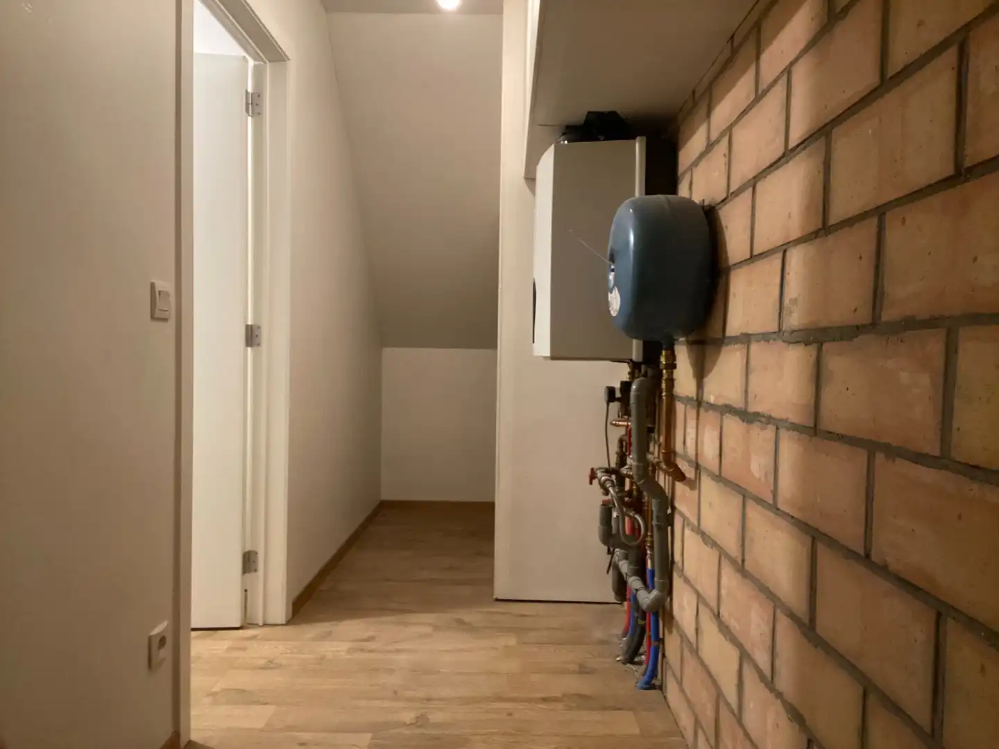 Verzorgd duplex-appartement met 3 slaapkamers en een autostaanplaats foto 14