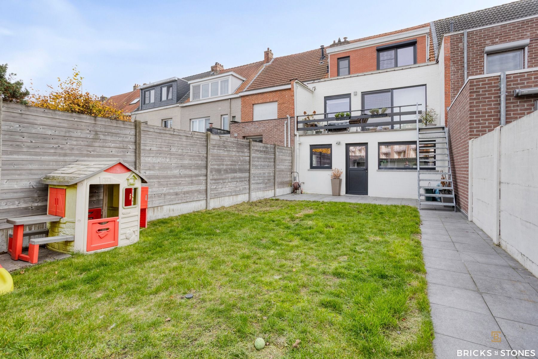 Knappe bel-etage woning met tuin foto 25