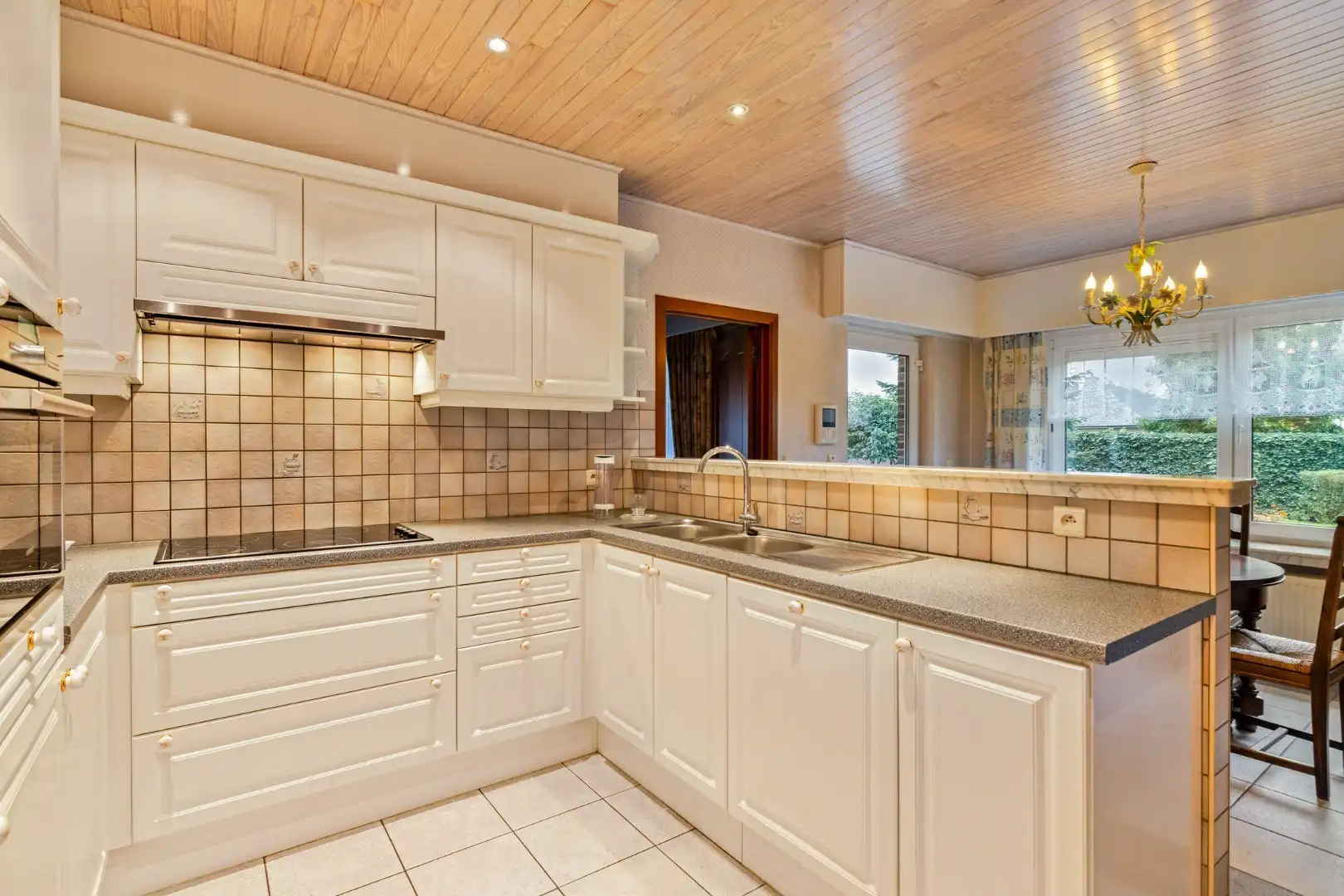 Zeer degelijke open bebouwing met tuin en garage foto 11