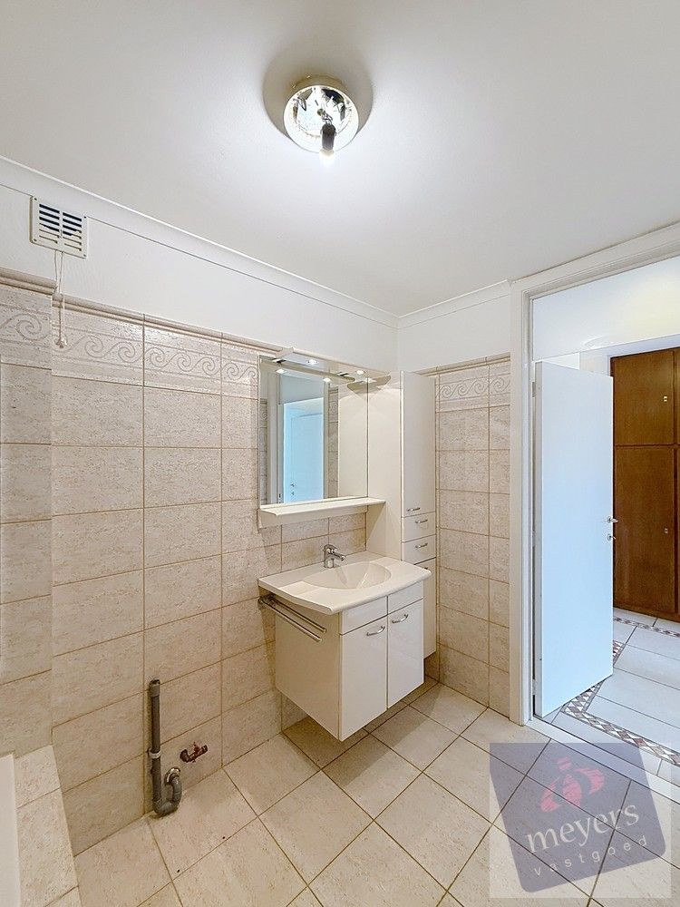 Ruim appartement met 2 slaapkamers en garage foto 12