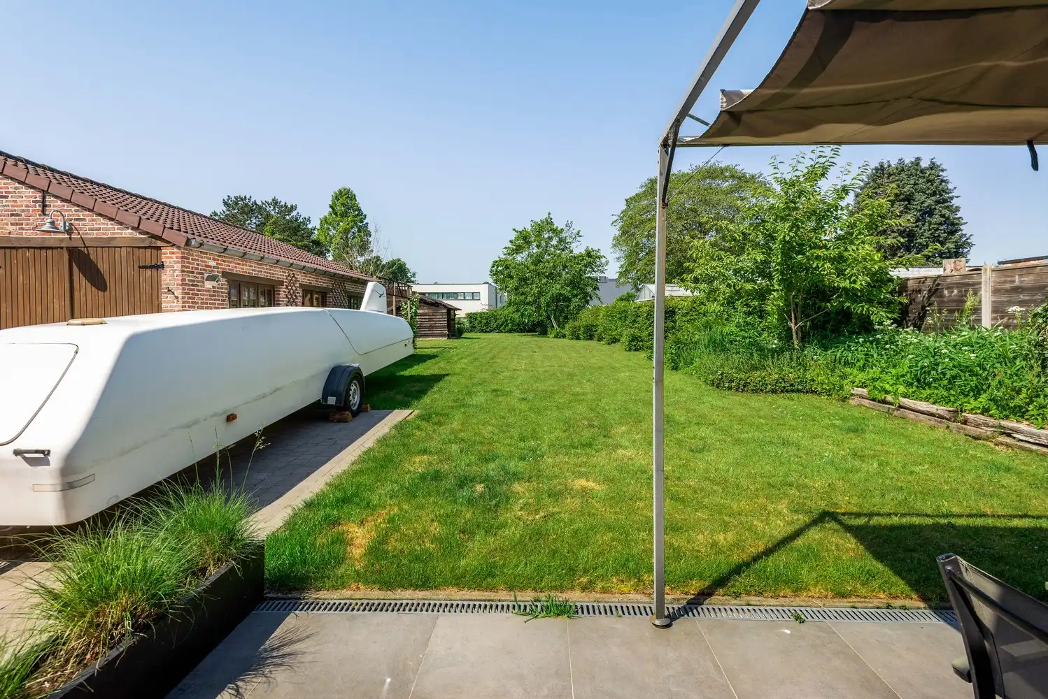 Karaktervolle hoeve met 4 slaapkamers, magazijn en ruime tuin te Lint foto 21