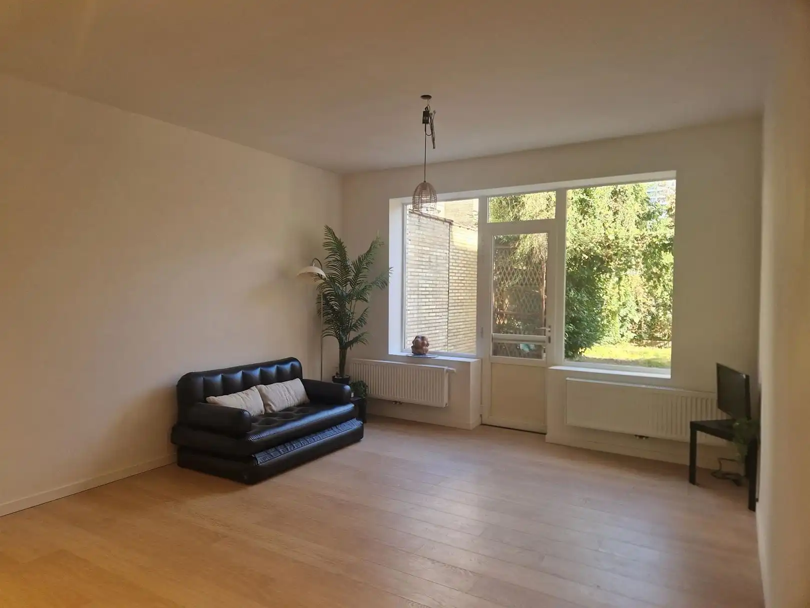 Gelijkvloers appartement met grote privatieve tuin. foto 4