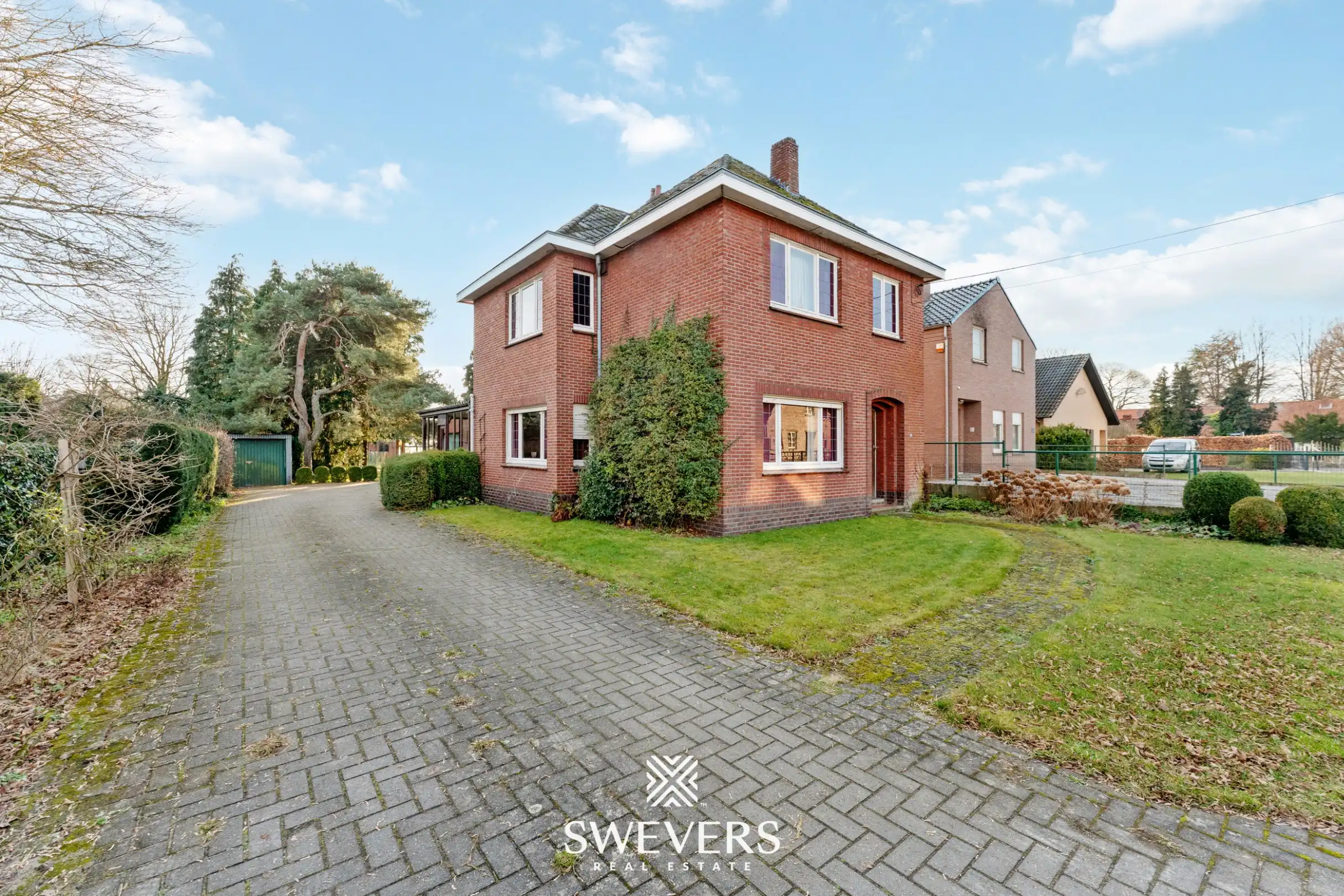 Vrijstaande woning met drie slaapkamers, bureauruimte en tuin in Houthalen foto 27