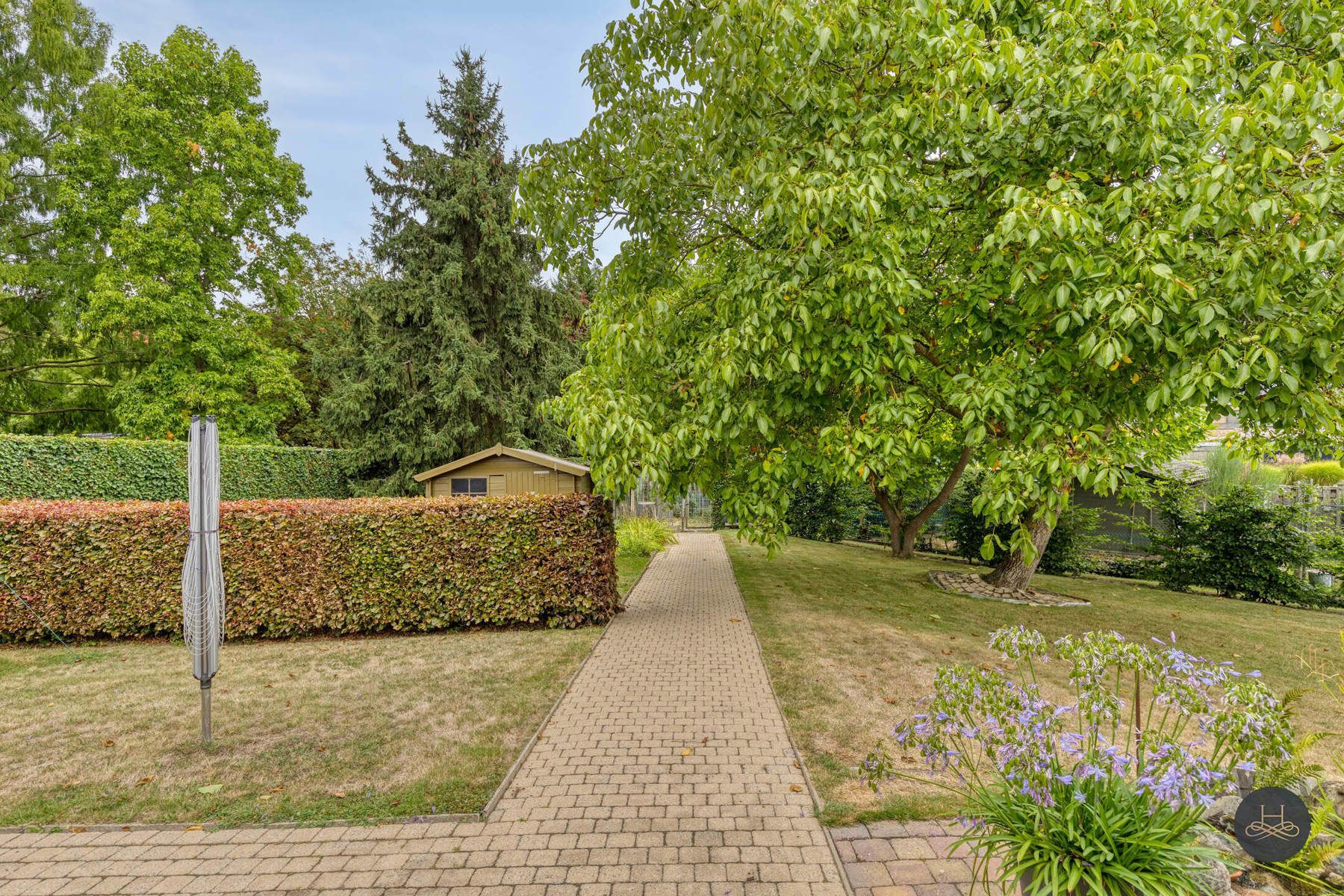 Gezinswoning met tuin nabij het centrum foto 23