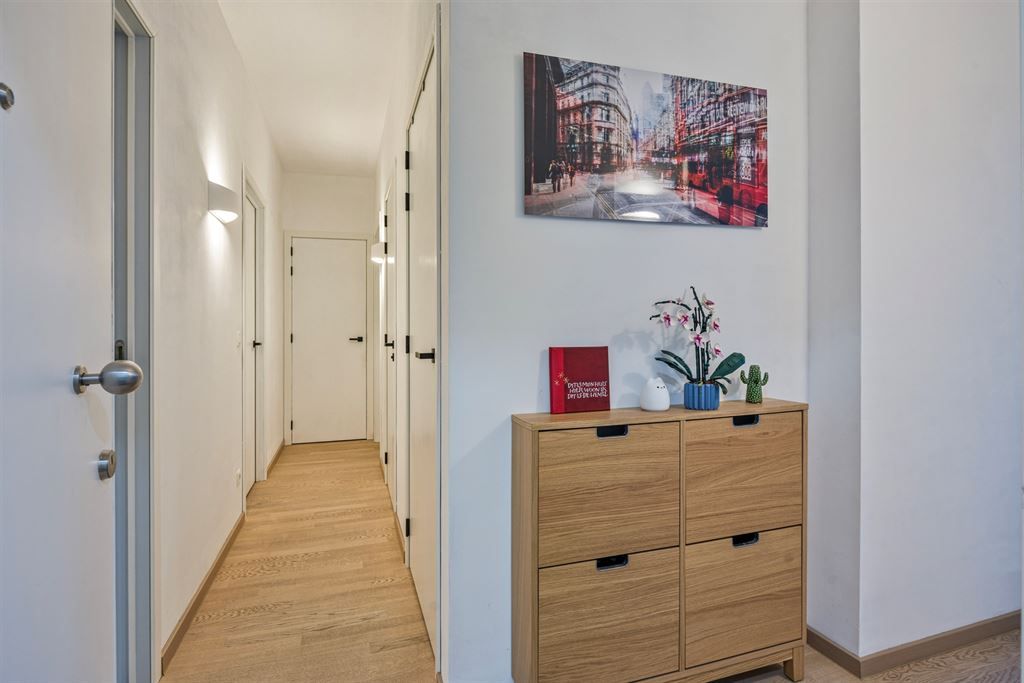 Prachtig nieuwbouwappartement met zicht over het Sluispark foto 7