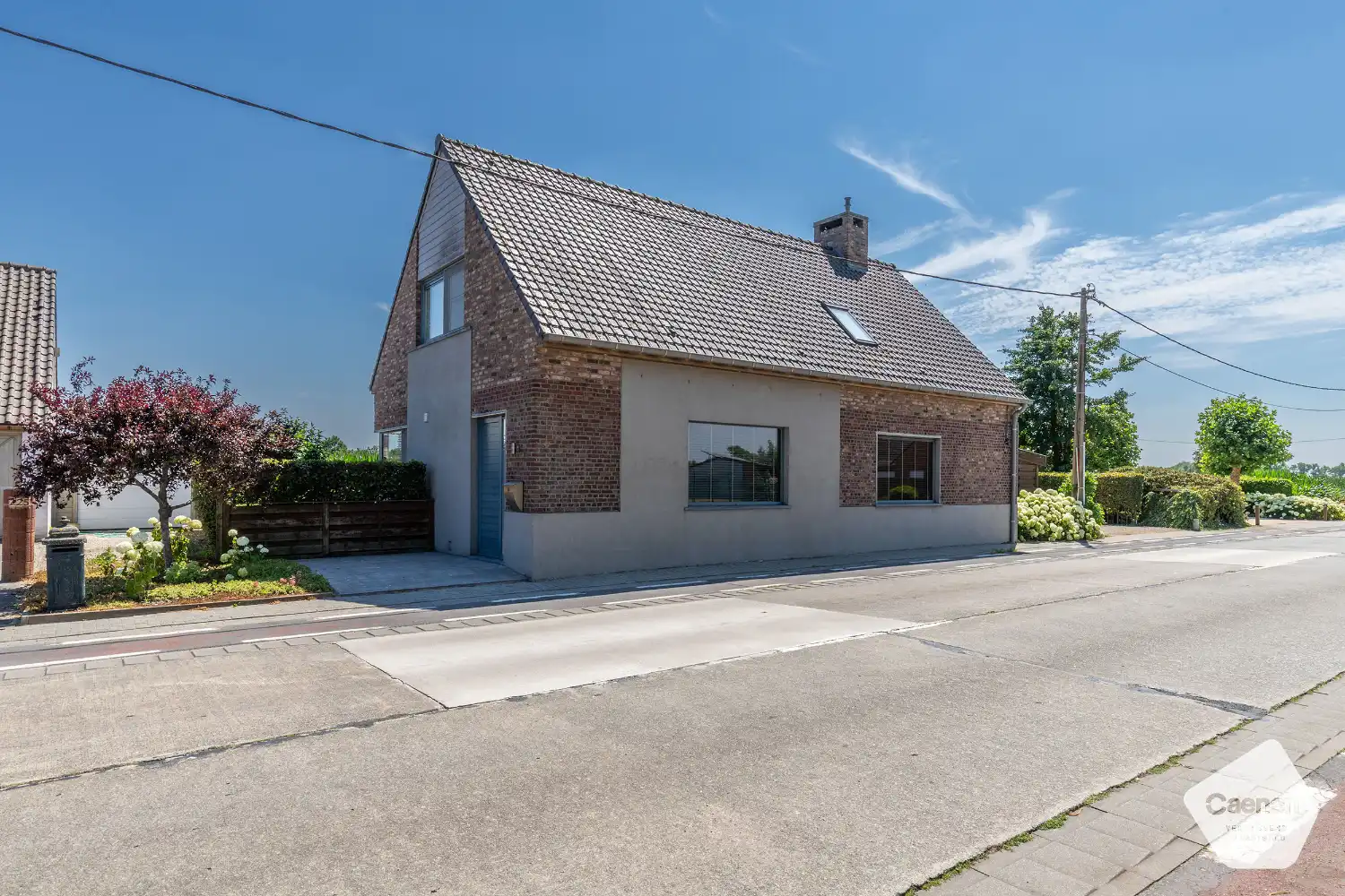 Stijlvol en energiezuinig huis met 3 slaapkamers en mooie tuin met uitzichten in Ruddervoorde foto 3