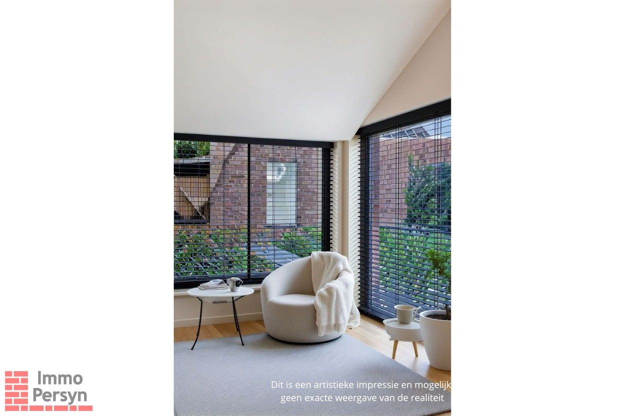 Ruim gelijkvloers appartement met tuin en 2 staanplaatsen. foto 22