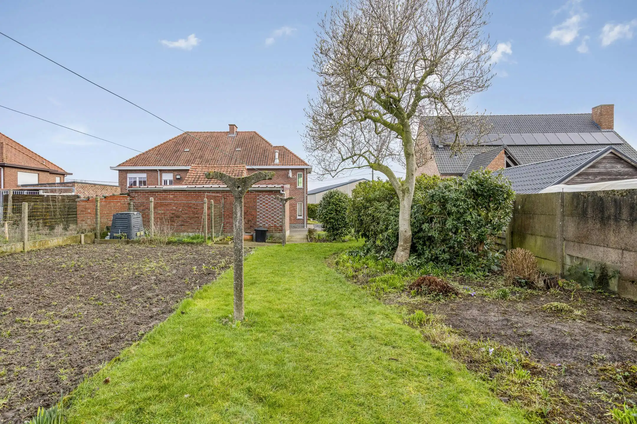 Te renoveren statige woning met royale tuin in Ardooie foto 24