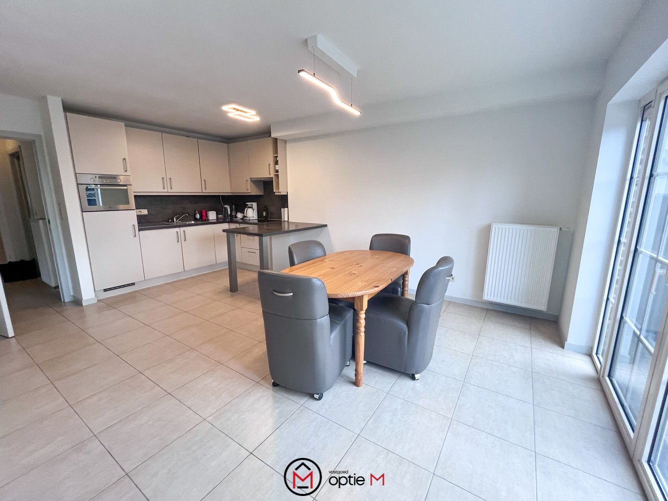 Gelijkvloers appartement met garage en terras in het hart van Munsterbilzen foto 4