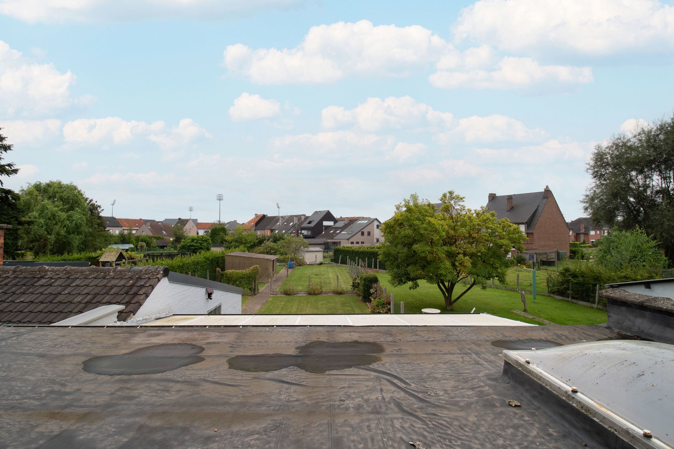 Charmante 3-gevelwoning met ruime tuin en garage foto 21