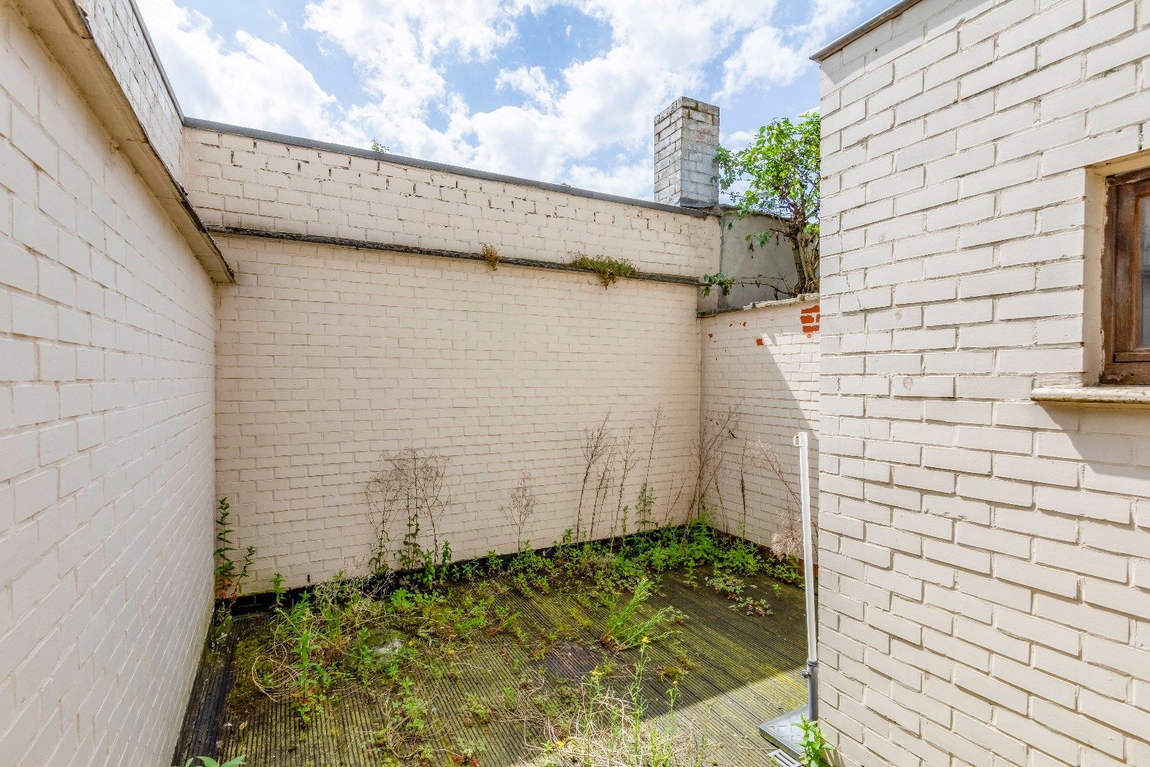 Te renoveren woning met stadstuin centraal gelegen in Sint-Amandsberg foto 18