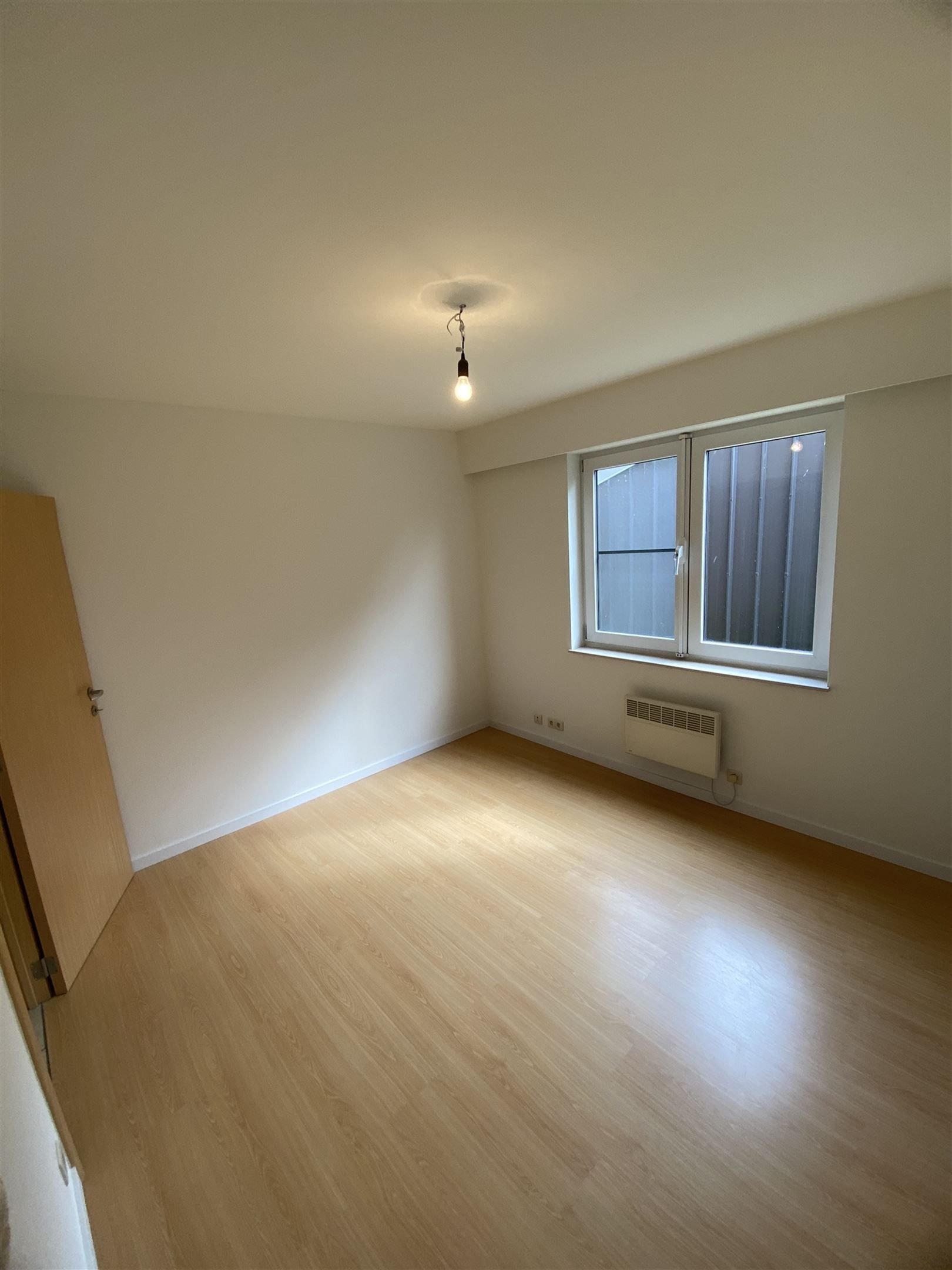 gelijkvloers appartement met garage foto 9