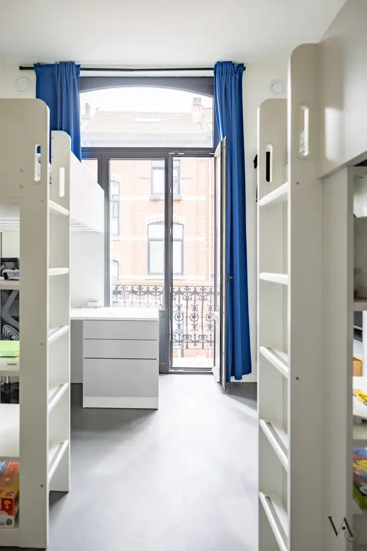 Exclusief triplexappartement met 4 slaapkamers in gerenoveerde herenwoning foto 18