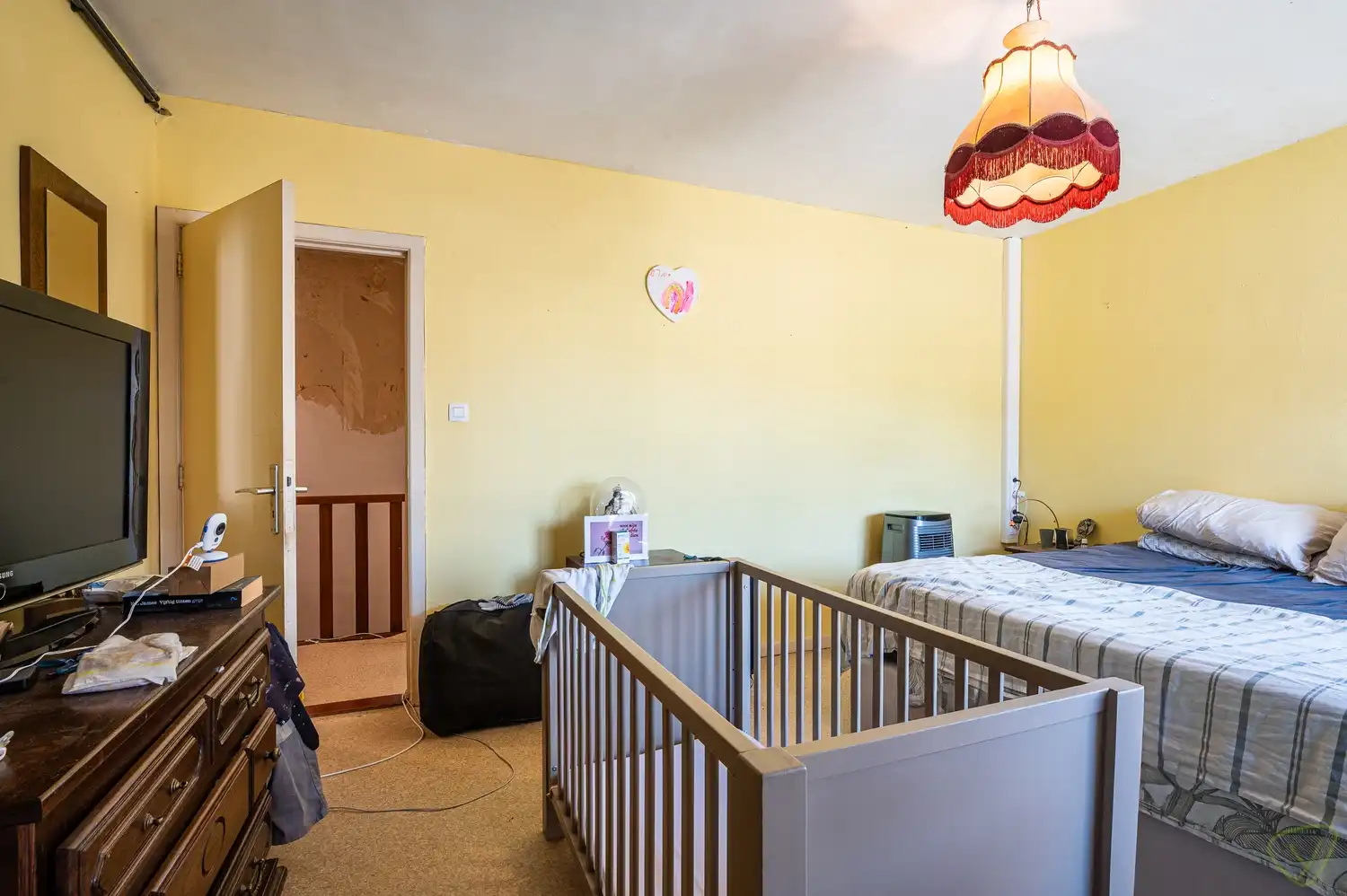 Te renoveren gezinswoning met grote tuin in het centrum van Bassevelde foto 12