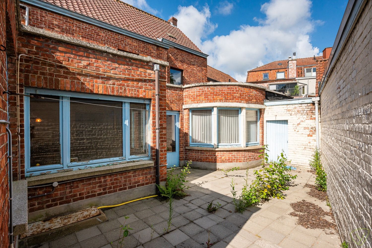 Woning met winkelruimte te koop in het centrum van Ursel foto 11