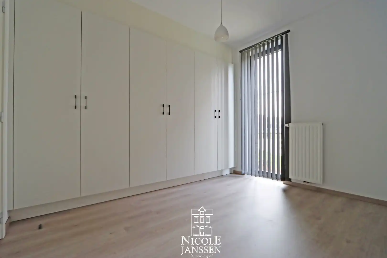 Gelijkvloers appartement met 2 slaapkamers, kelderberging en autostandplaats foto 7