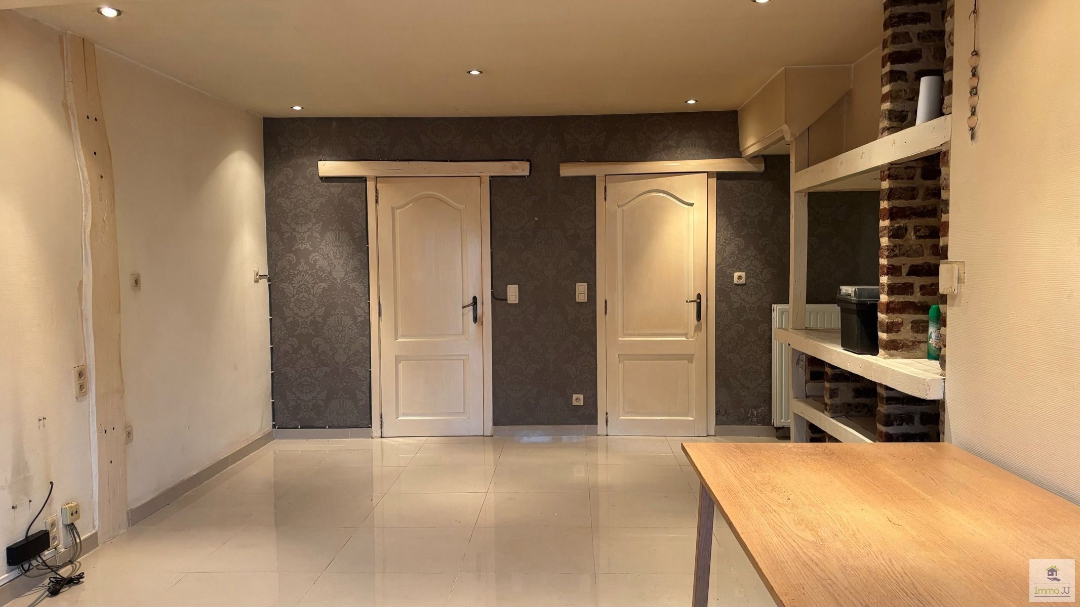Te renoveren gelijkvloers appartement met garage  foto 2