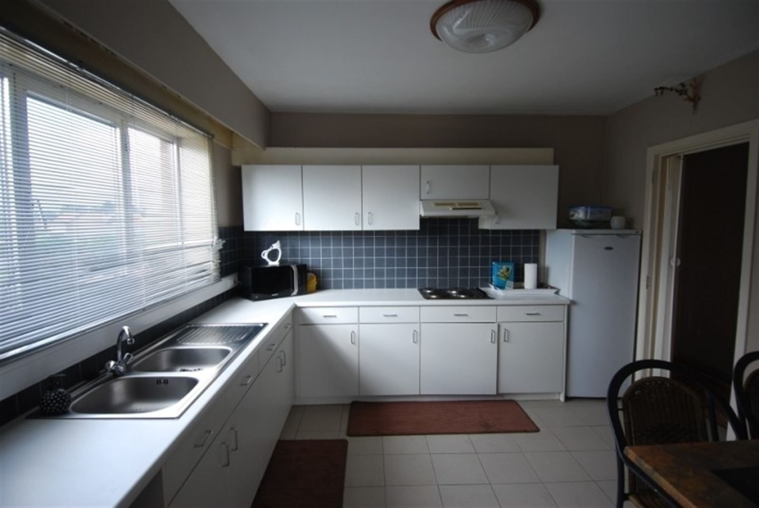 Ruim appartement met 3 slaapkamers en garagebox, gelegen in een rustige, kindvriendelijke omgeving. foto 3