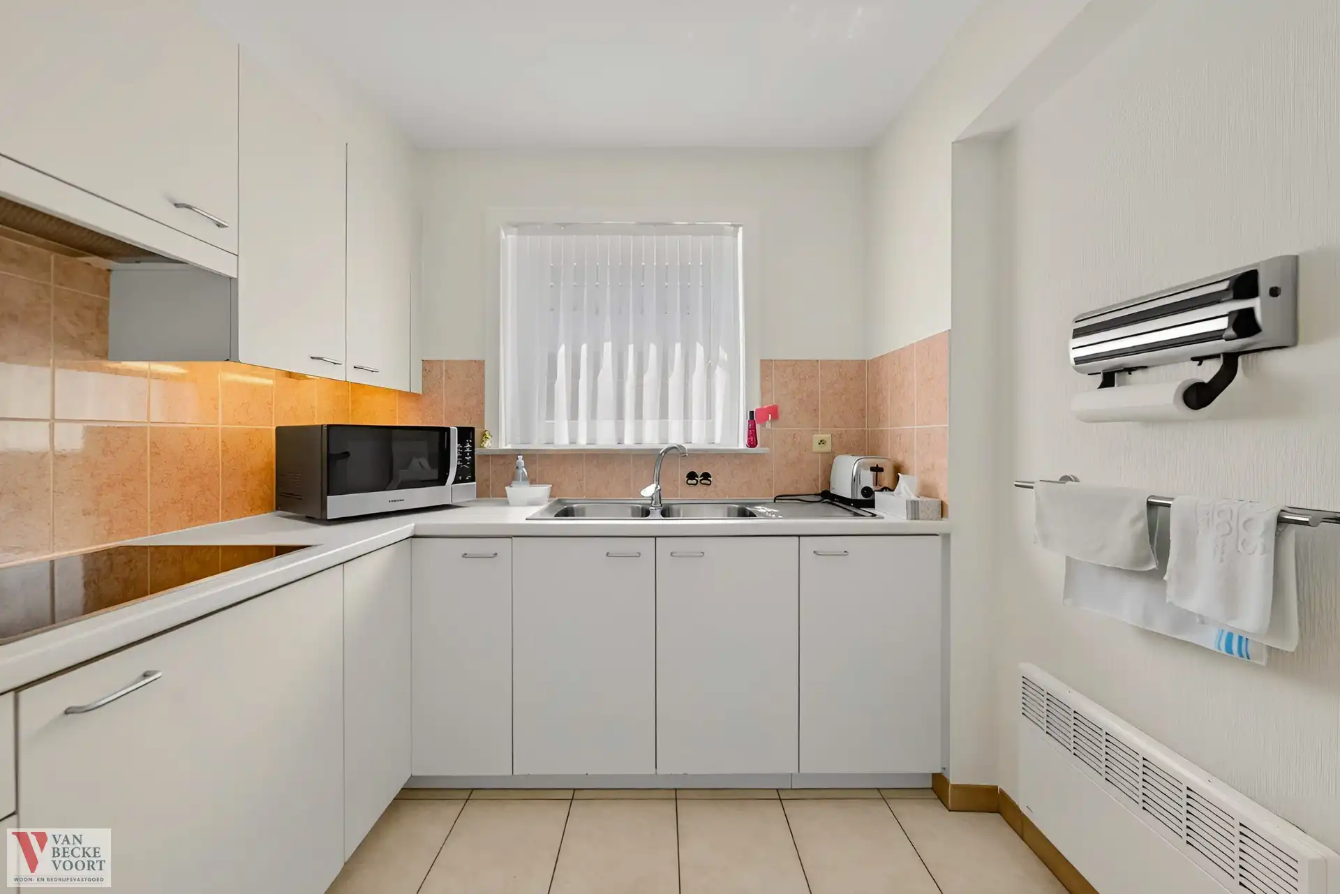 Lichtrijk 2-slaapkamerappartement met stadszicht foto 7
