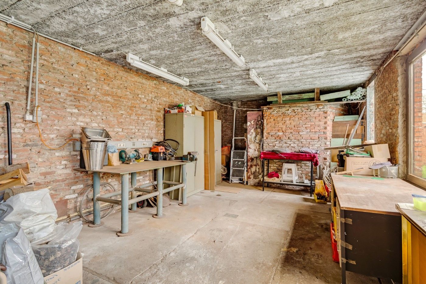 Rustig gelegen woning met 2 slpk., atelier, tuin en dubbele garagebox foto 17