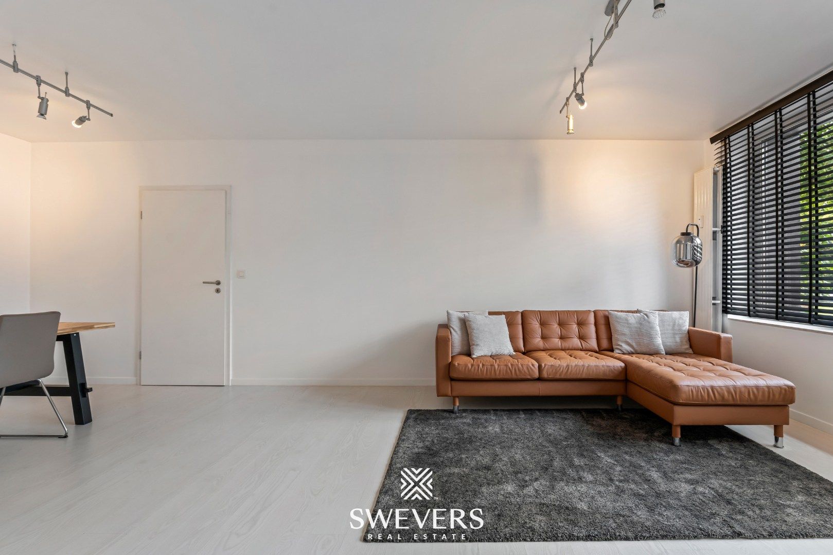 Instapklaar en energiezuinig 2-slaapkamerappartement in het centrum van Heppen foto 7
