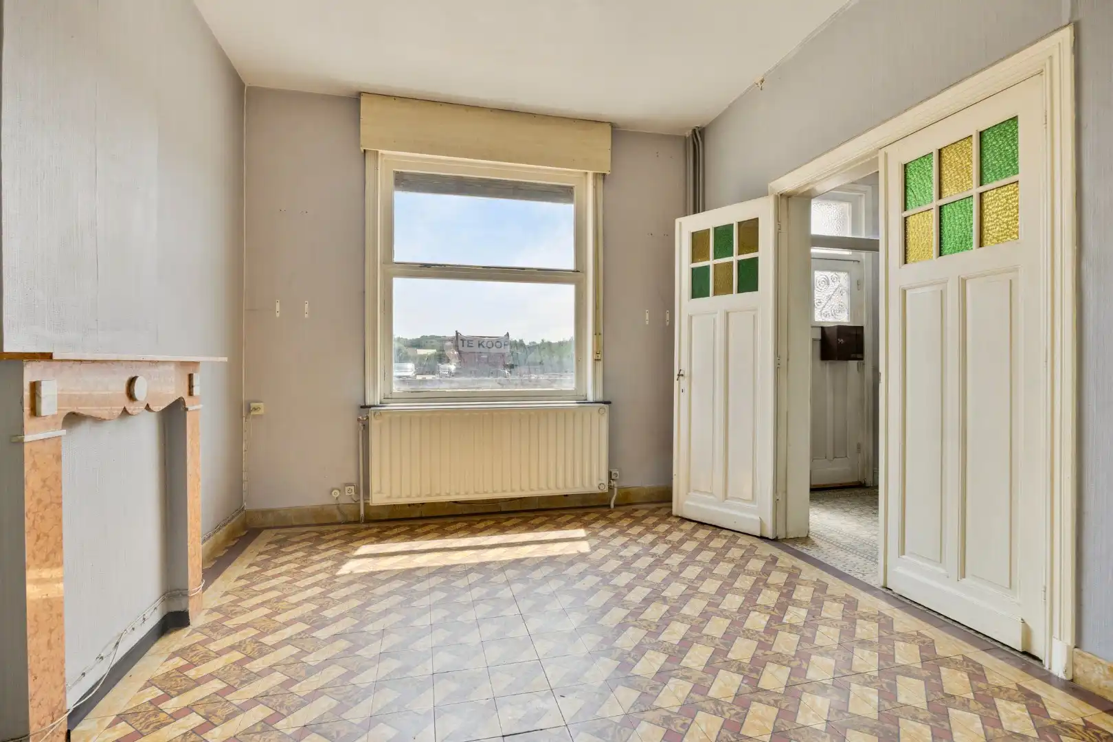 Ruime te renoveren woning met 3 slaapkamers in Lubbeek met doorgang langs het perceel van de buren. EPC: 736 KWH/m² foto 5