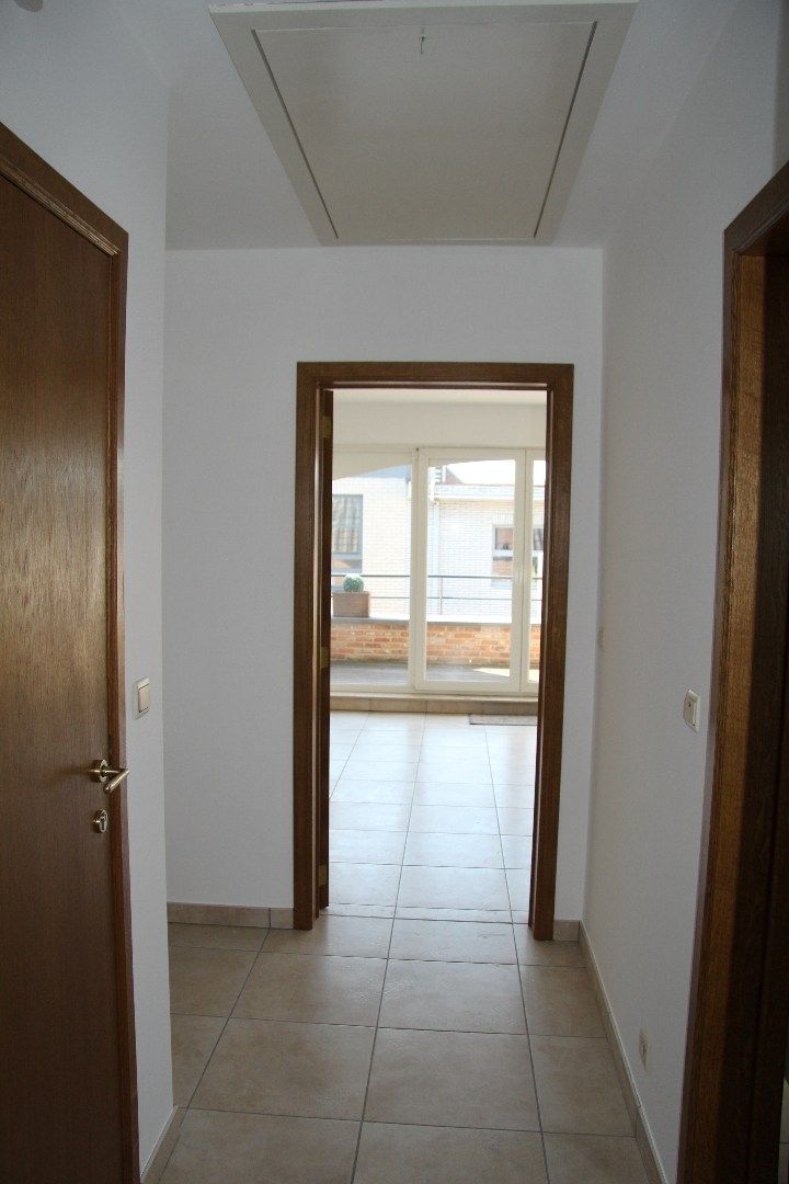 Ruim dakappartement met 2 slk, terras en garage foto 10