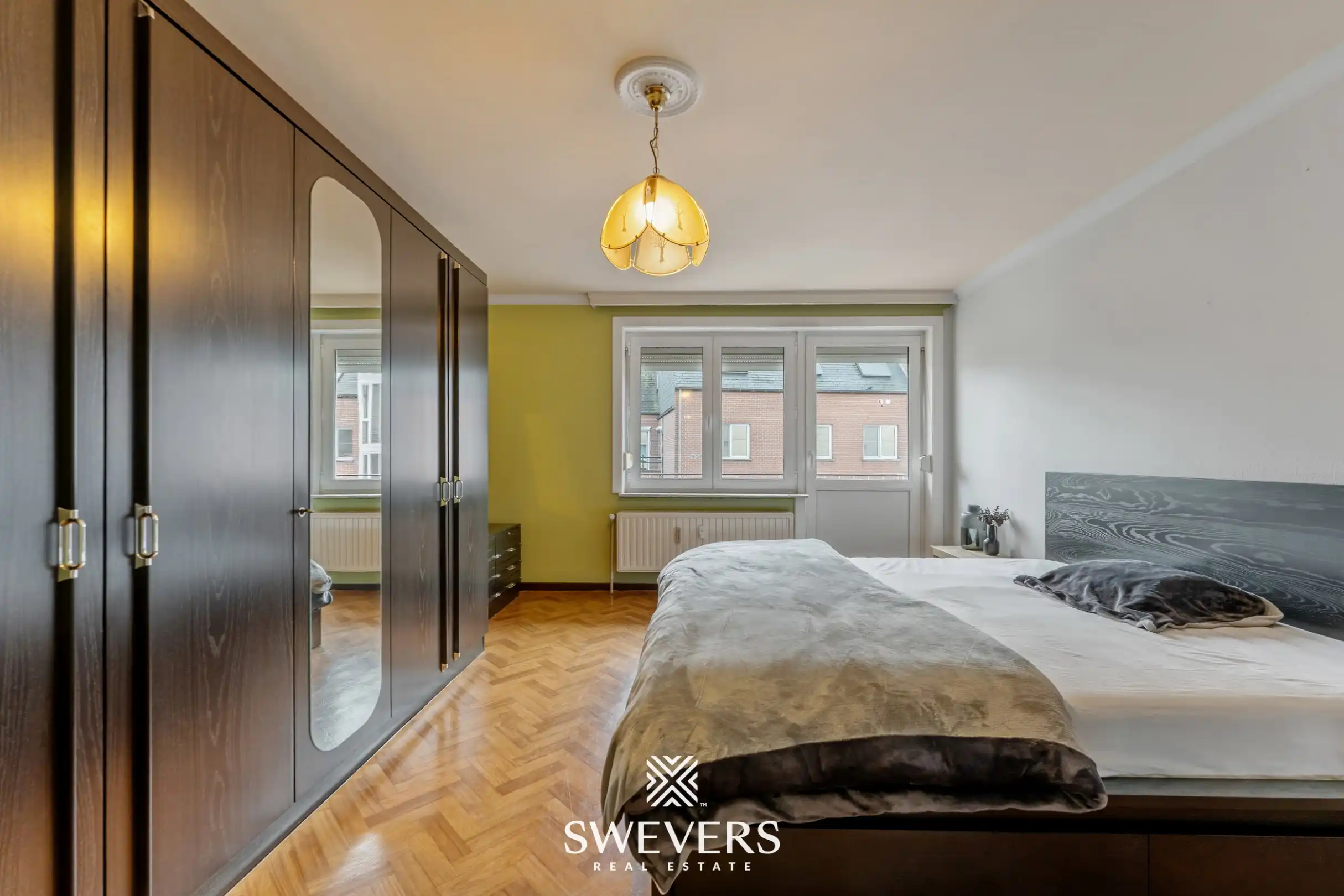 Ruim en lichtrijk 3-slpk appartement met 2 terrasjes in hartje Genk foto 16