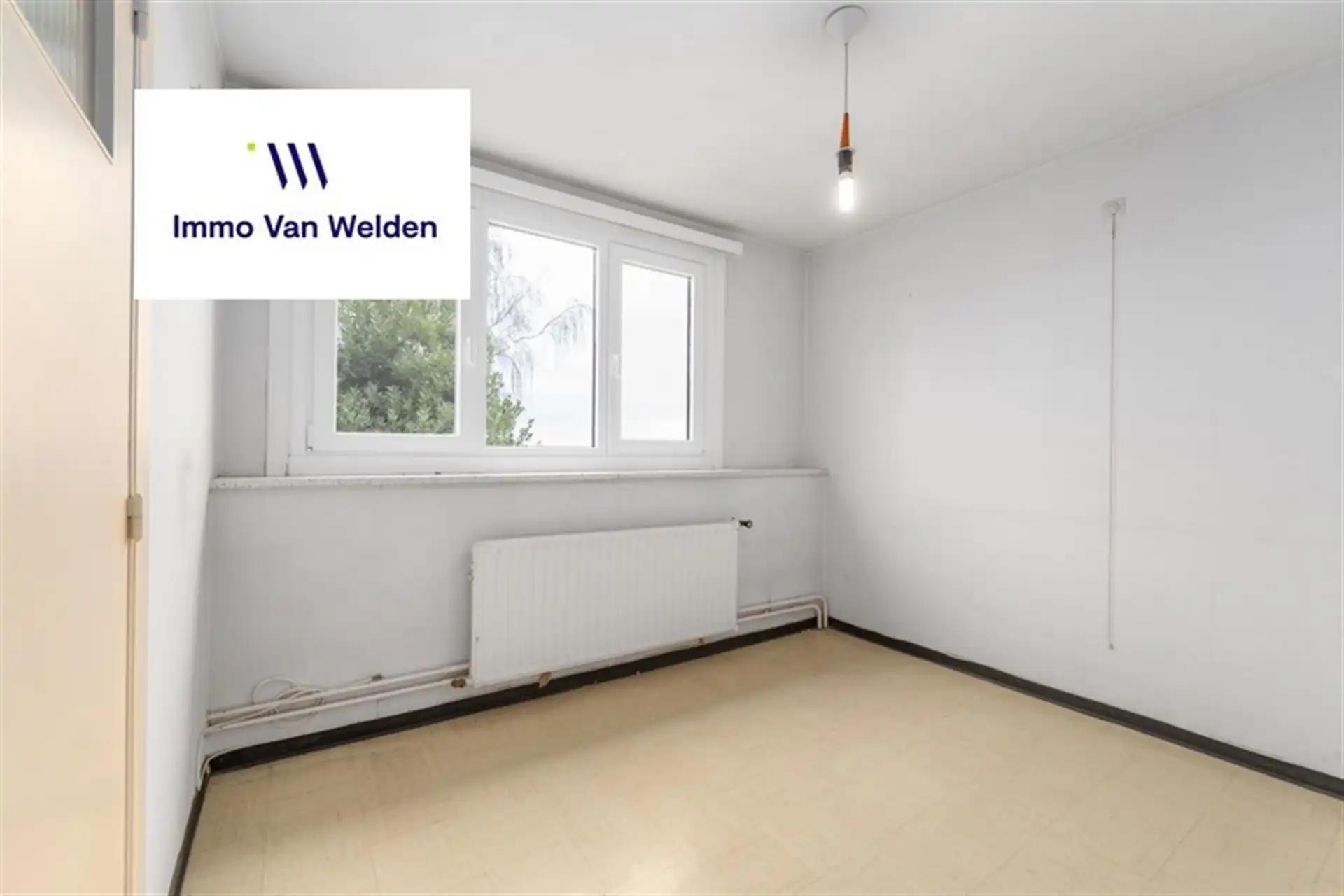 Te renoveren halfopen woning met garage en tuin in landelijke omgeving te Wortegem-Petegem. foto 15