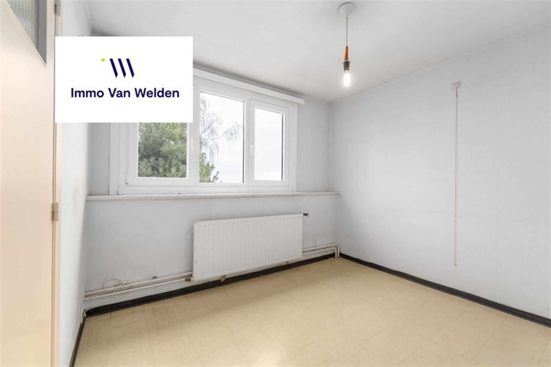 Te renoveren halfopen woning met garage en tuin in landelijke omgeving te Wortegem-Petegem. foto 15