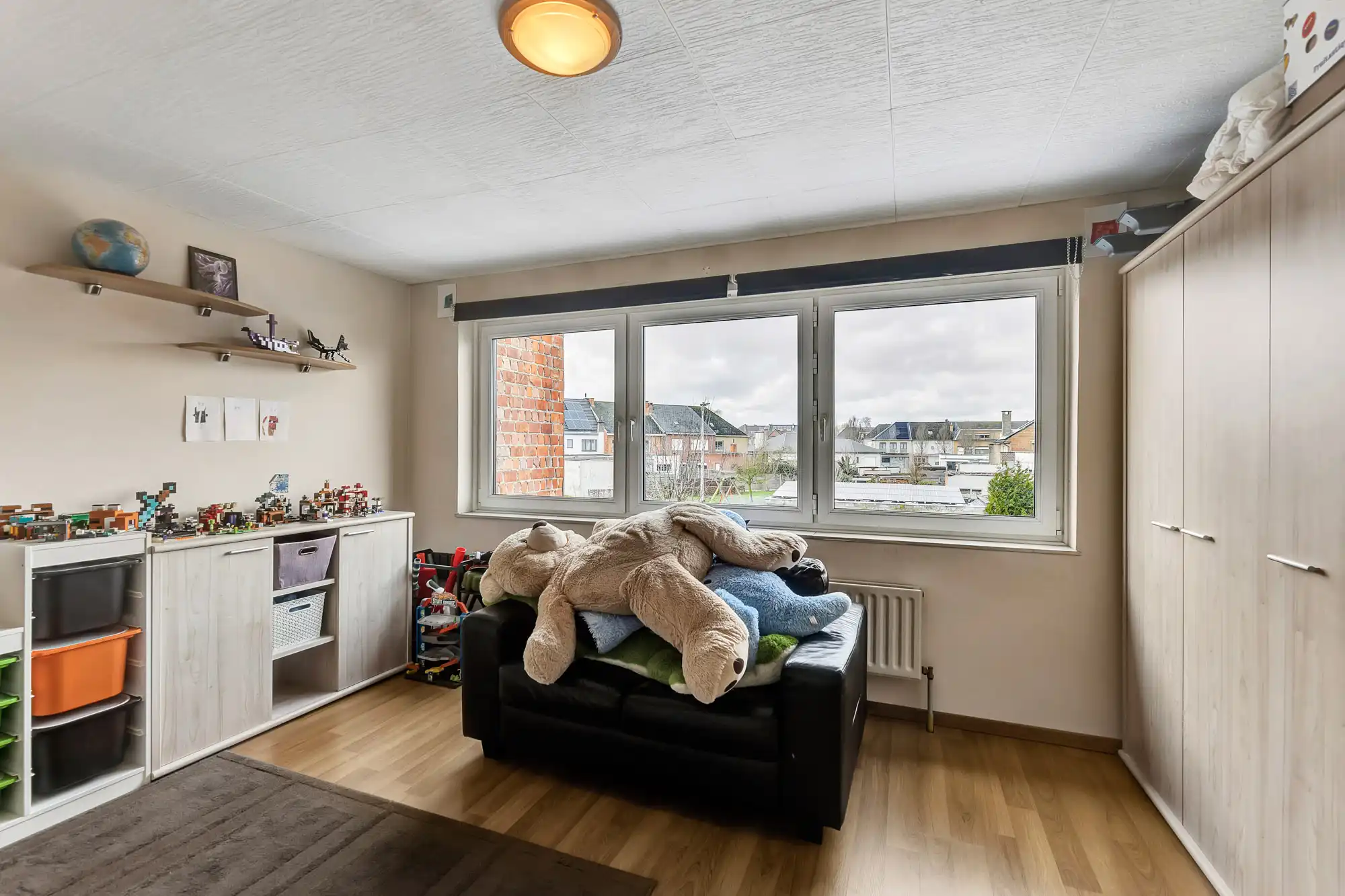 Gezellige gezinswoning met veranda, tuin en garage te koop foto 13