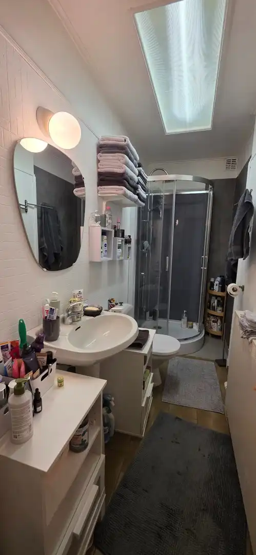 Gerenoveerd gelijkvloers 2-slaapkamerappartement met gezellig terras foto 11