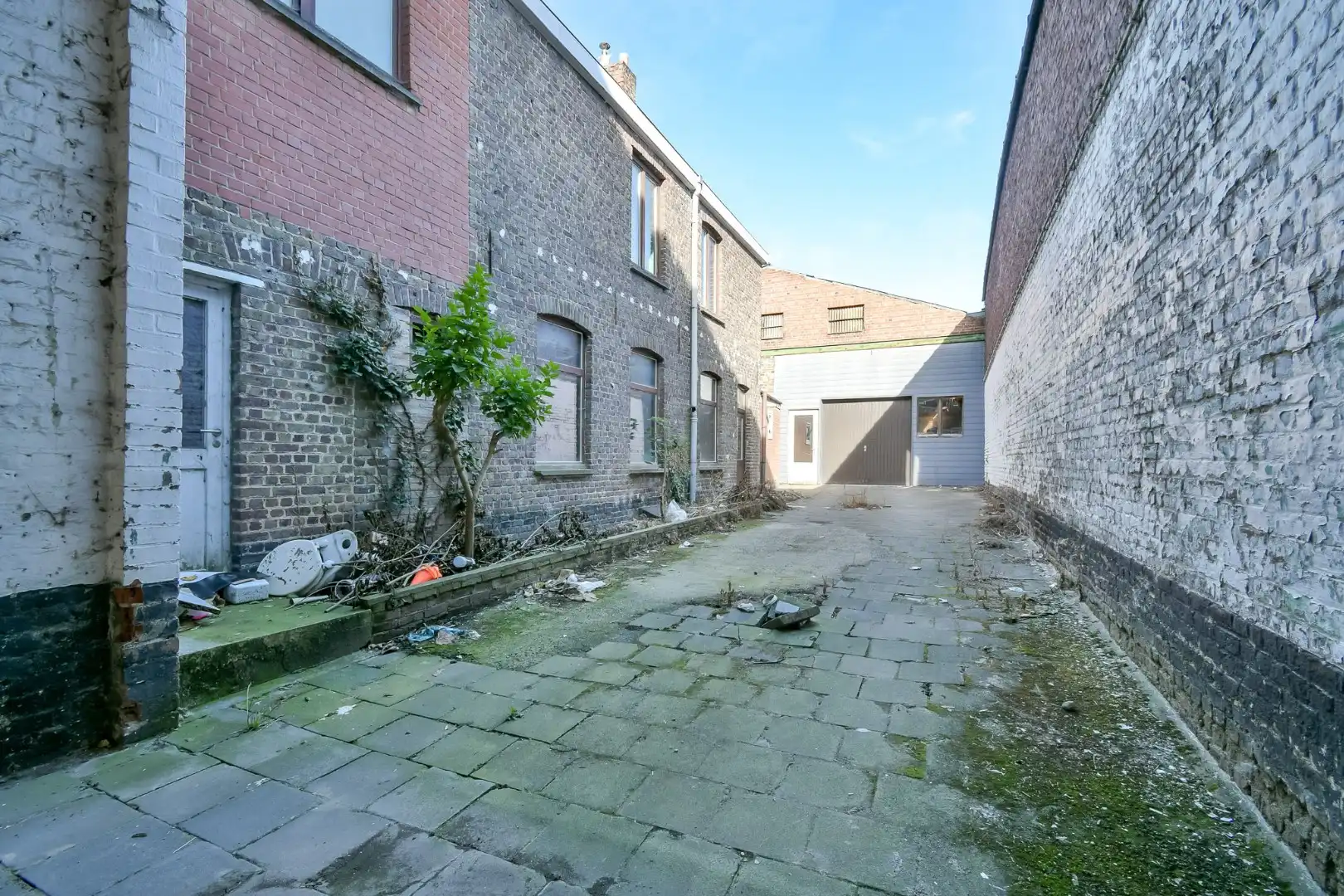 Te renoveren woningen met bijhorende loods! foto 2