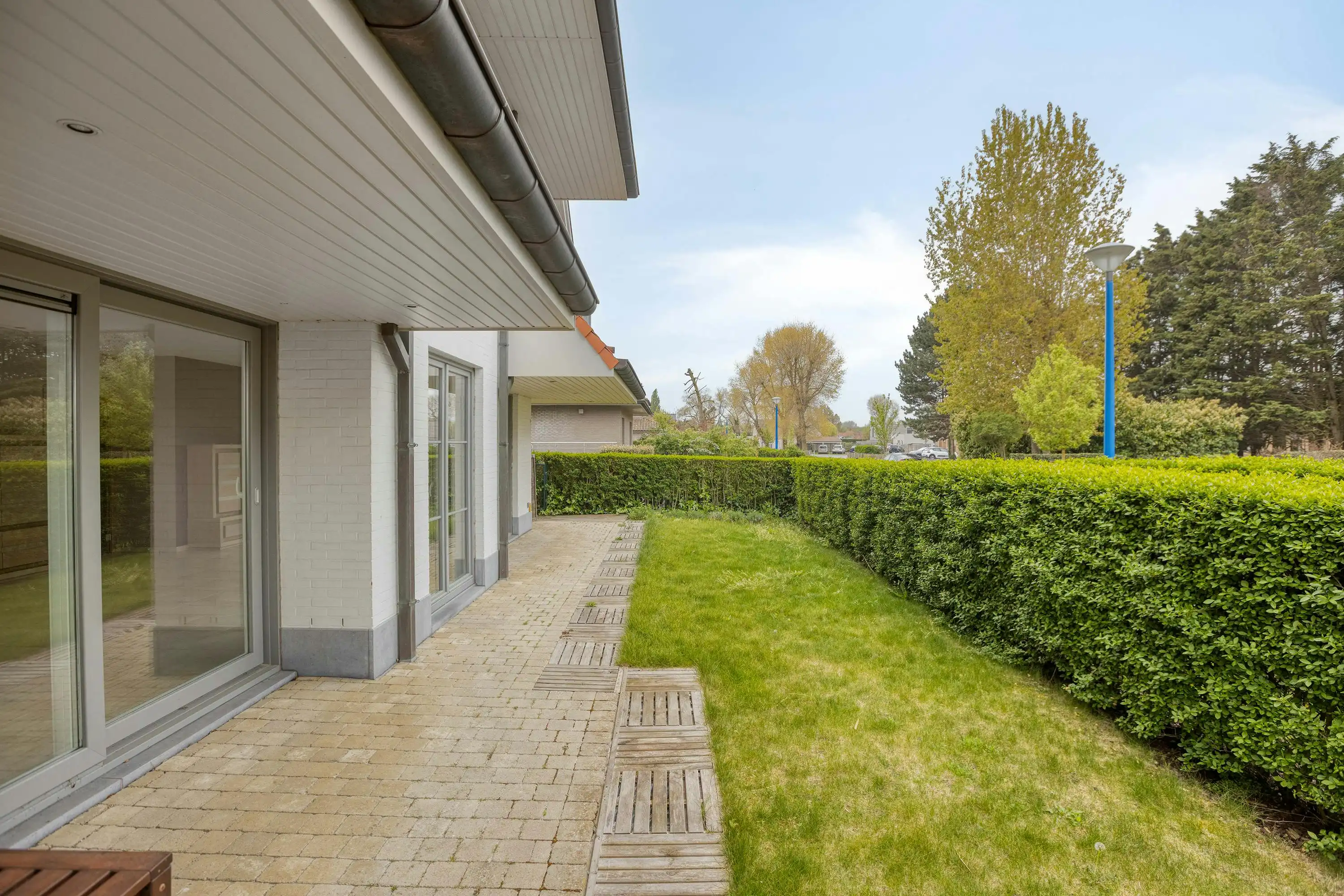 Gelijkvloers appartement (110m²) met tuin op topligging! foto 9