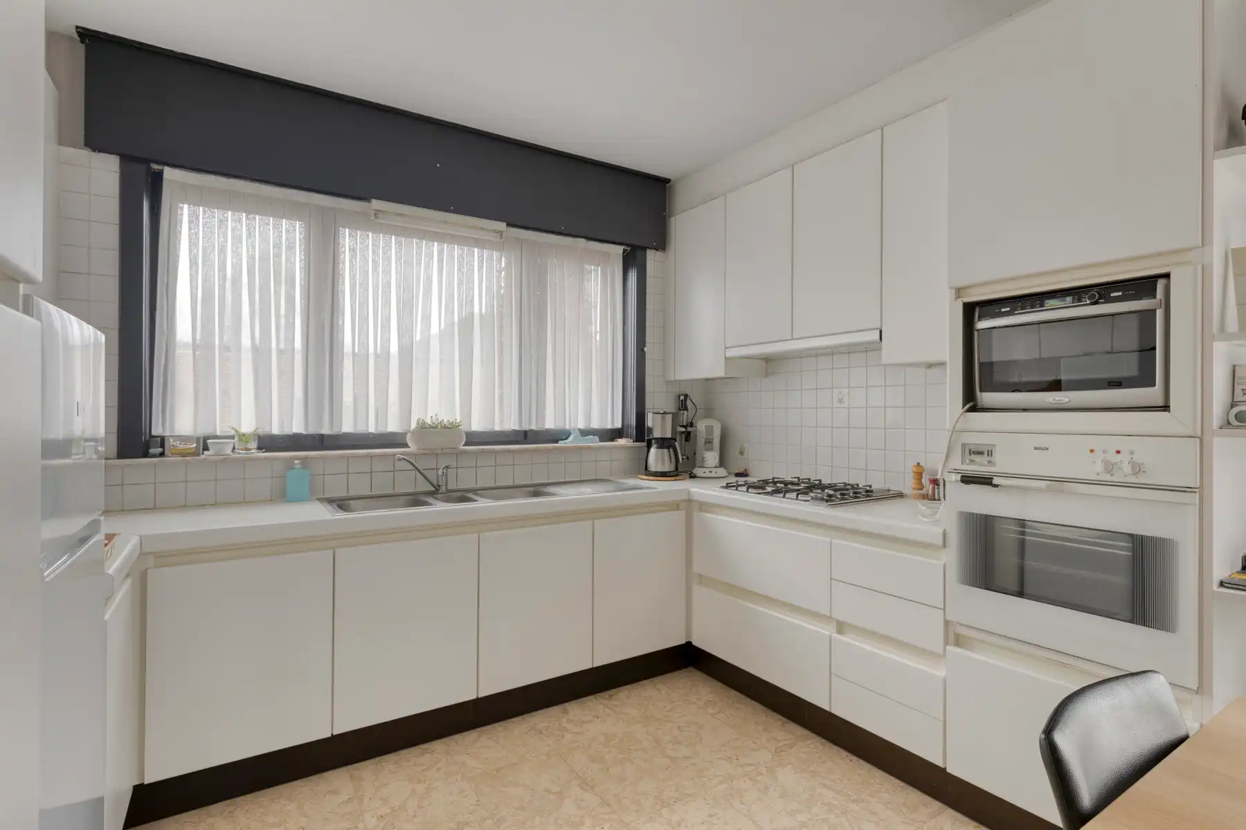 Kloeke woning met tuin en garage! foto 6