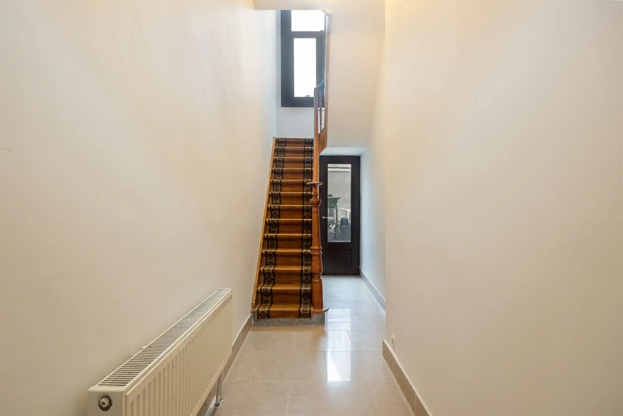 Instapklare woning met 2 à 3 slaapkamers en stadskoer foto 7