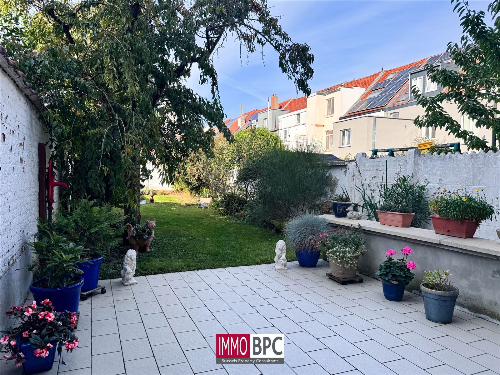 Charmante opbrengsteigendom of meergezinswoning met tuin, terrassen en garage in rustige straat van Anderlecht foto 6