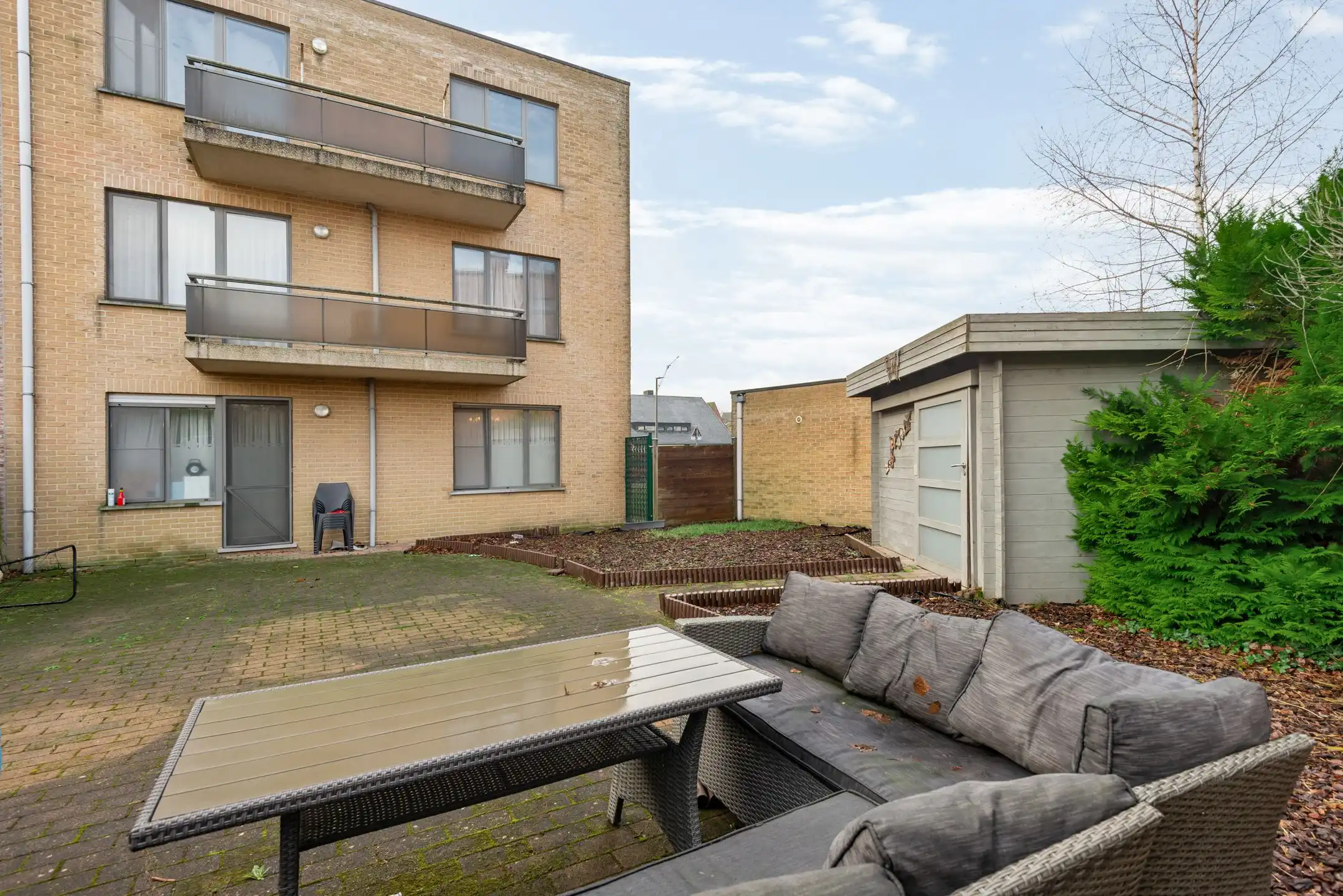 Opbrengsteigendom met 3 appartementen + garageboxen in Wommelgem te koop! foto 14