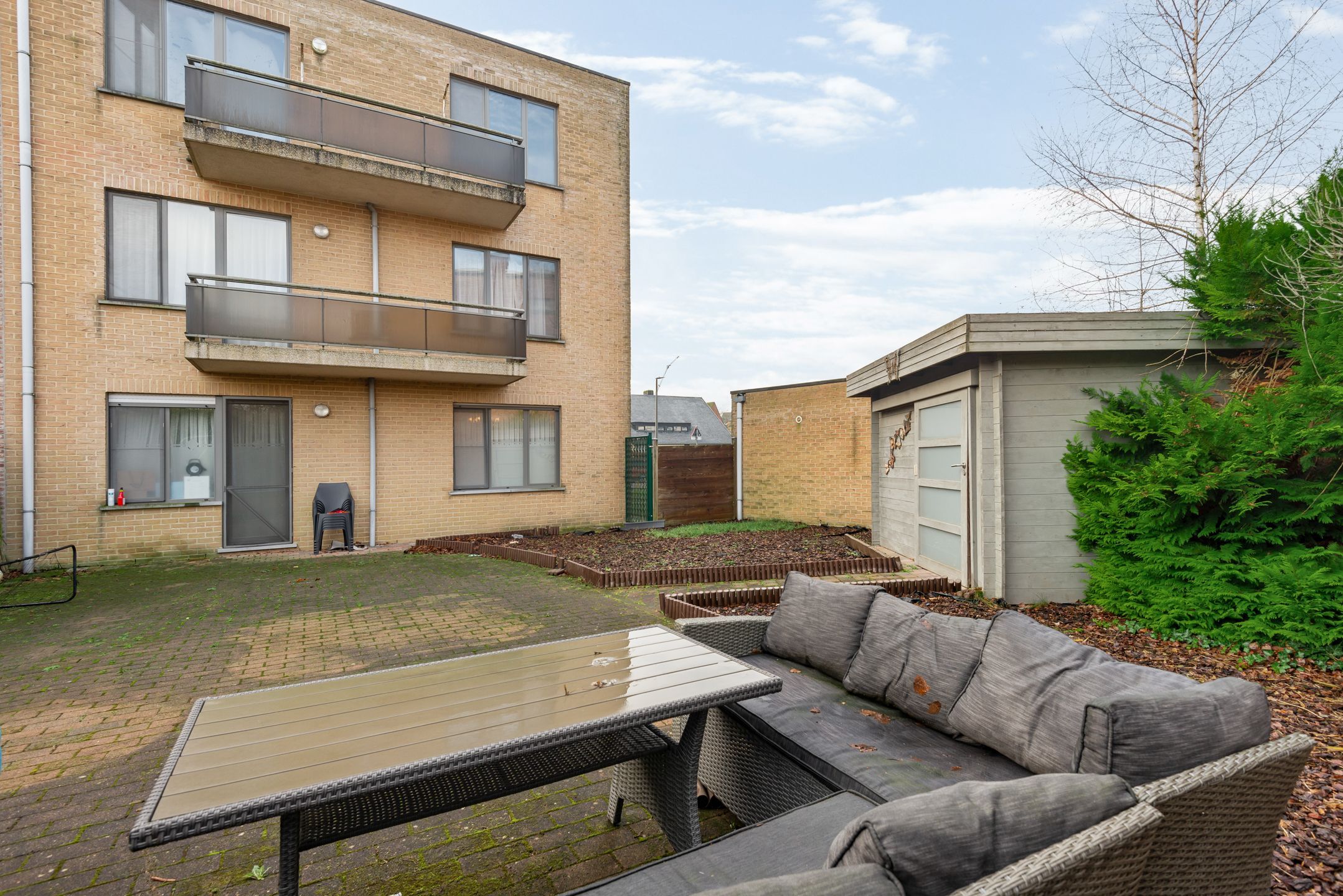 Opbrengsteigendom met 3 appartementen + garageboxen in Wommelgem te koop! foto 14