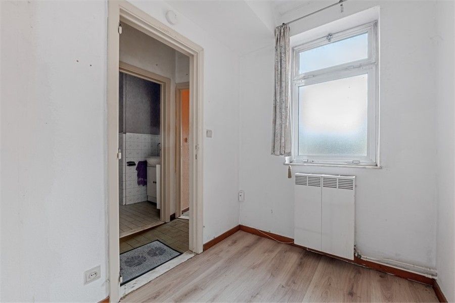 OP TE FRISSEN APPARTEMENT IN HET CENTRUM VAN SINT-TRUIDEN foto 15