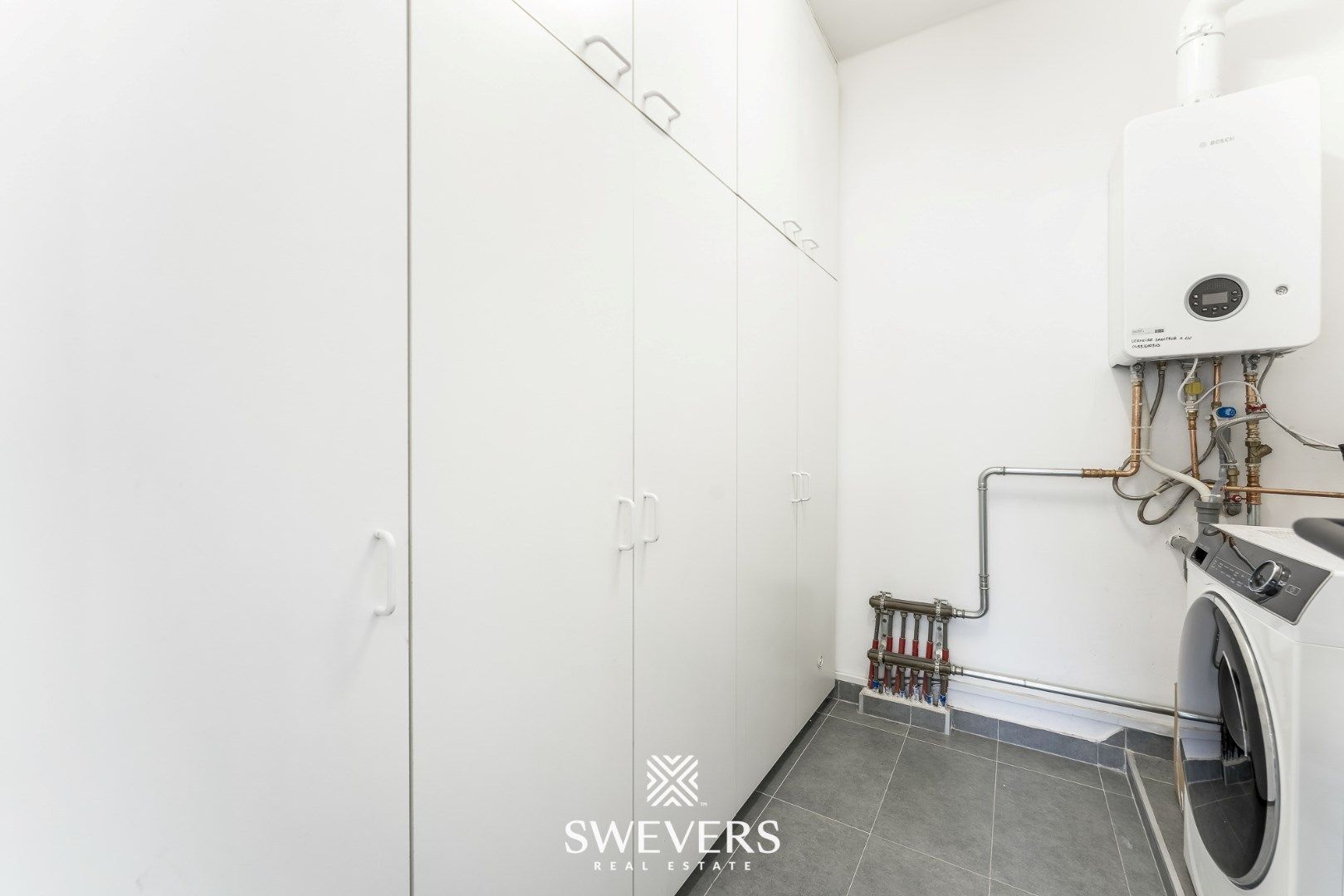 Volledig gerenoveerd appartement van 102 m² met ruim terras en garagebox foto 14