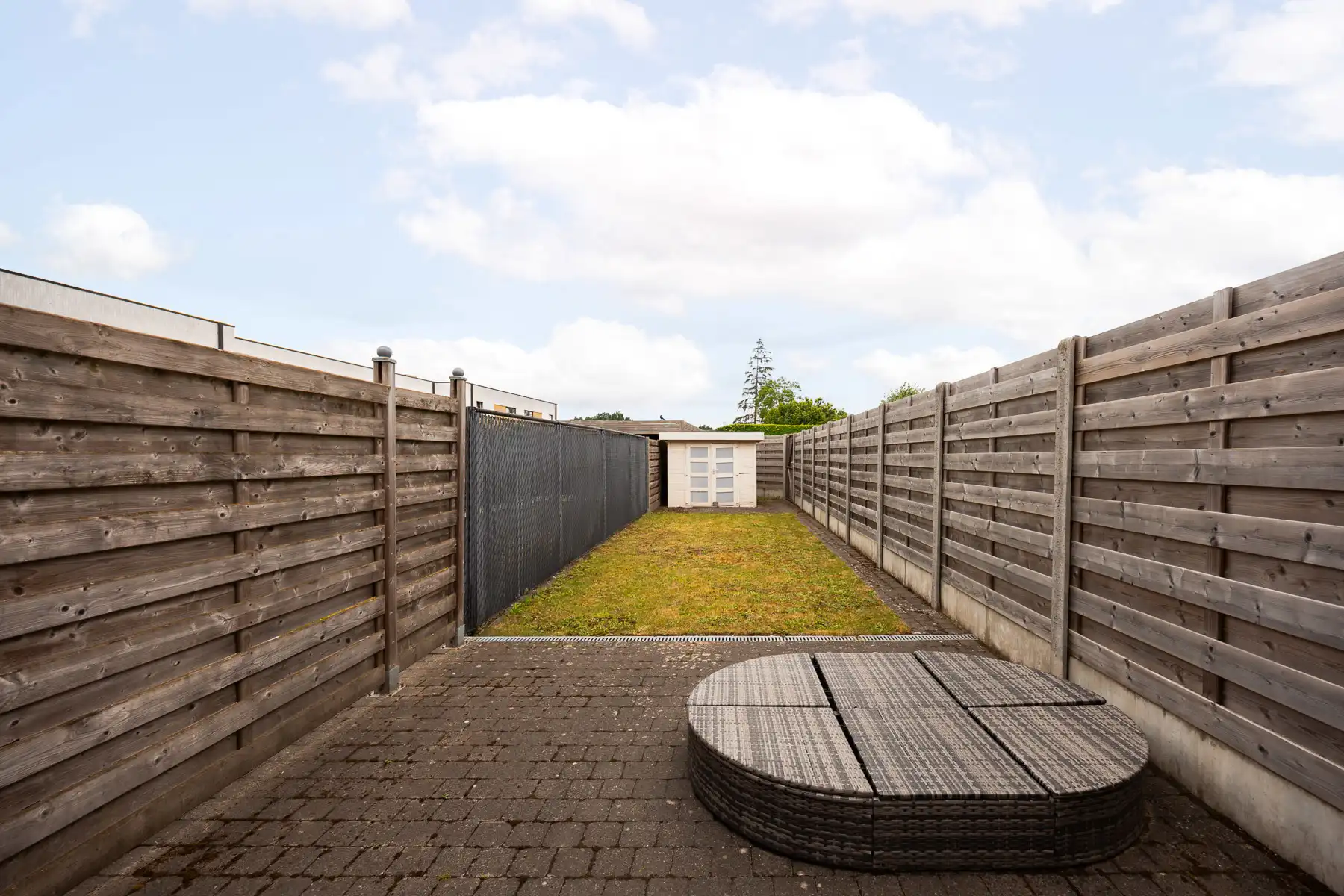 Instapklaar gelijkvloers appartement met tuin en carport foto 14