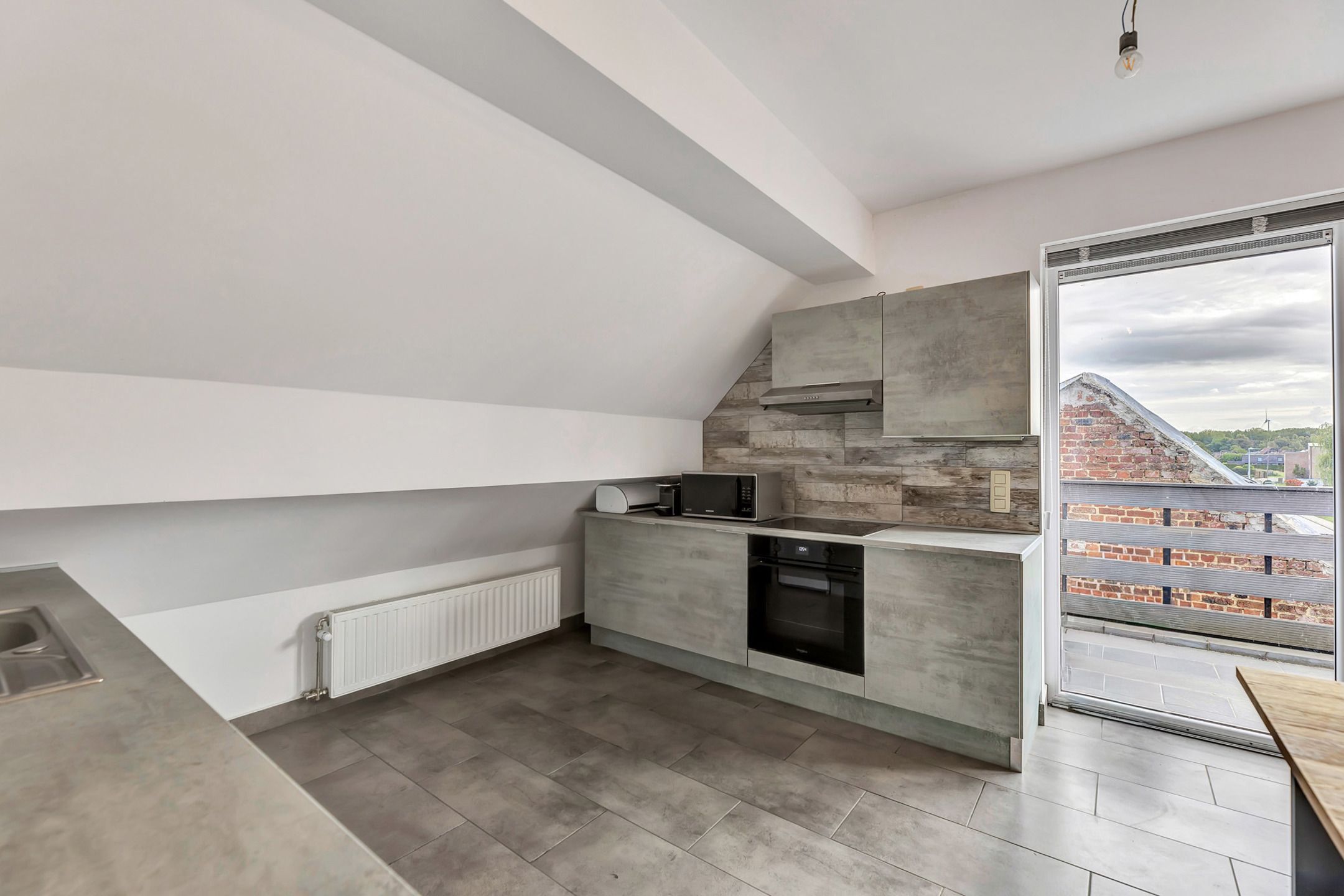 Dakappartement met terras en 2 autostaanplaatsen foto 7