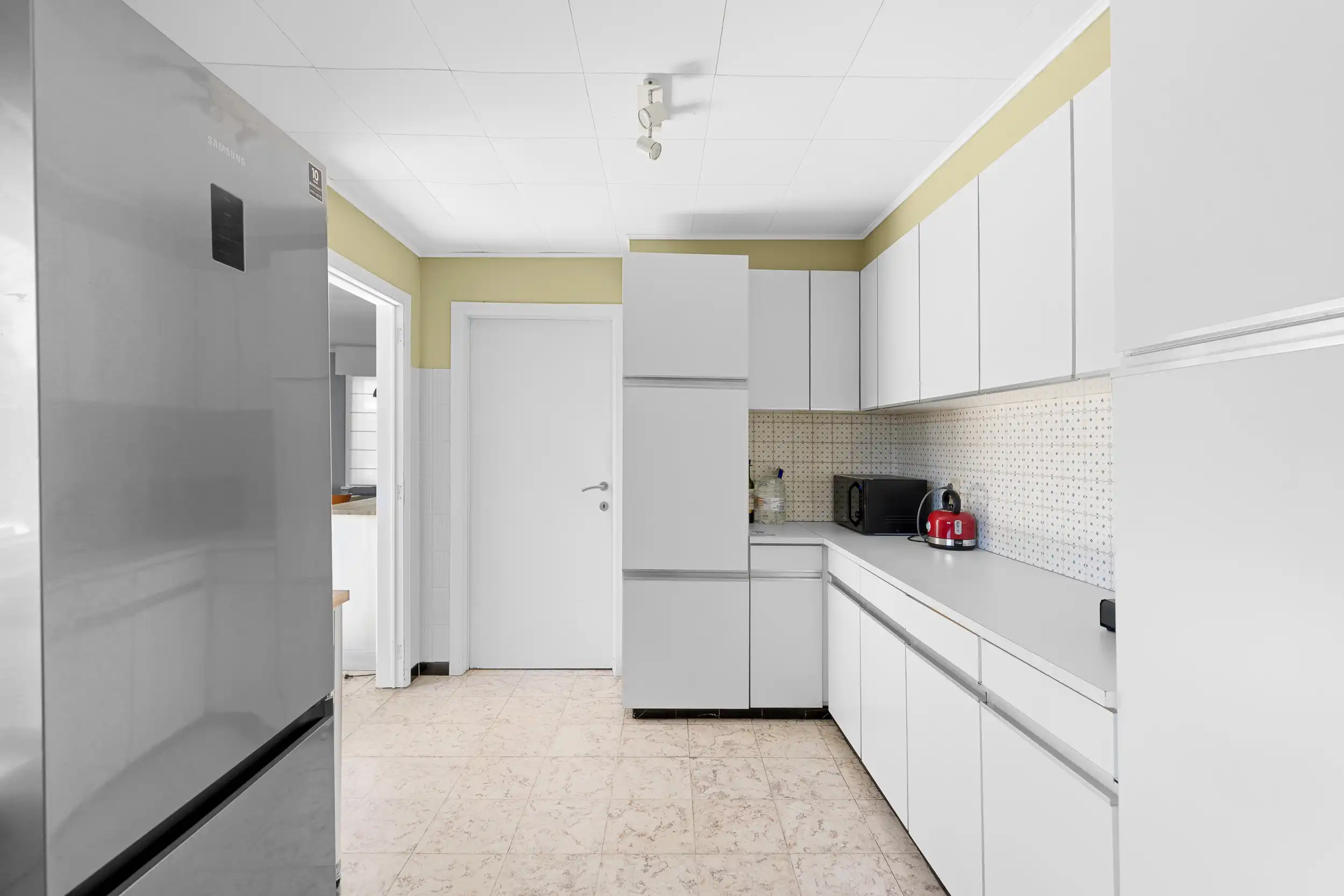 Gelijkvloers wonen met tuin en potentieel foto 7