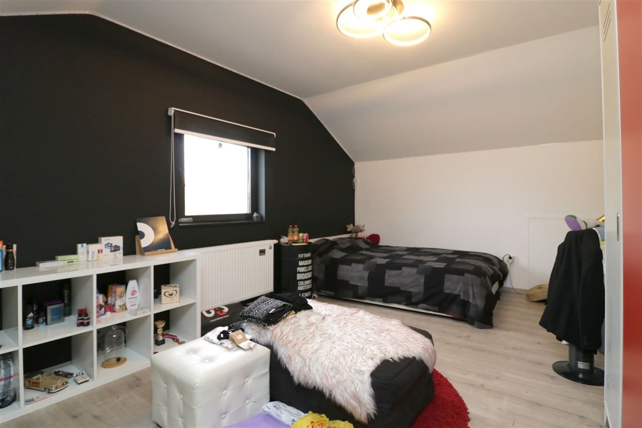 Gezellige woning, 4 slpk., inpandige garage, tuin foto 23