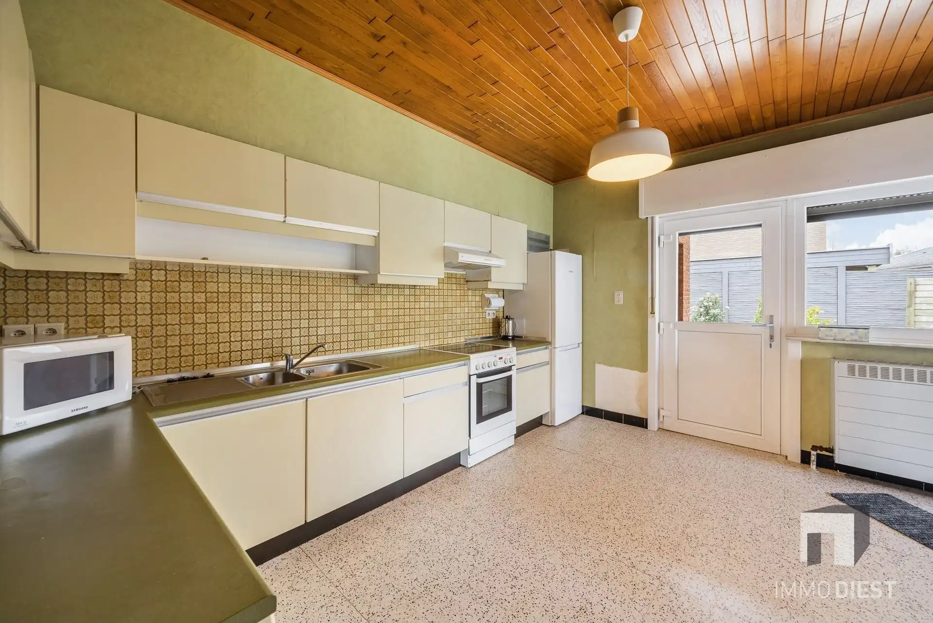 Op te knappen betaalbare split-level woning te Schaffen, kort bij de Bossen van Hees foto 15