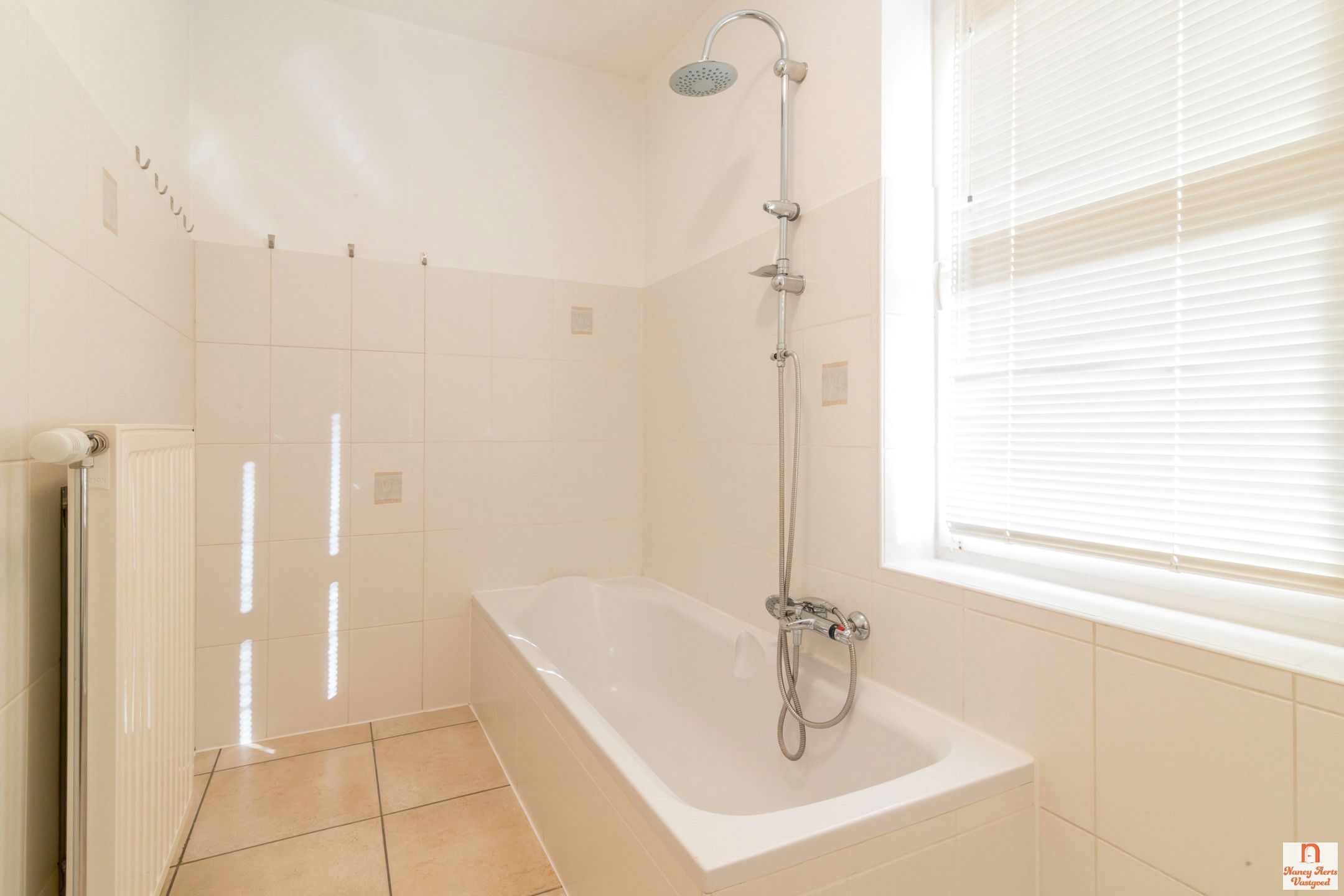 Lichtrijk gelijkvloers appartement met tuinzicht in Kuringen foto 16