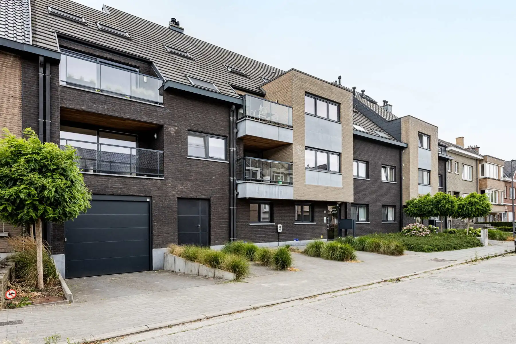 Gelijkvloers app. met tuin en 2 ondergrondse staanplaatsen foto 22