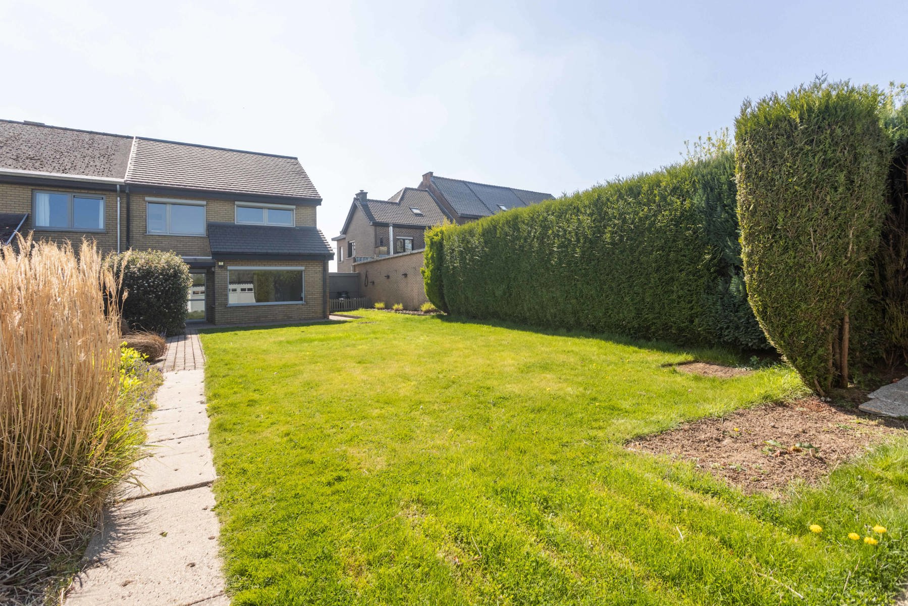 Aangename instapklare woning met 4slpk en tuin foto 22