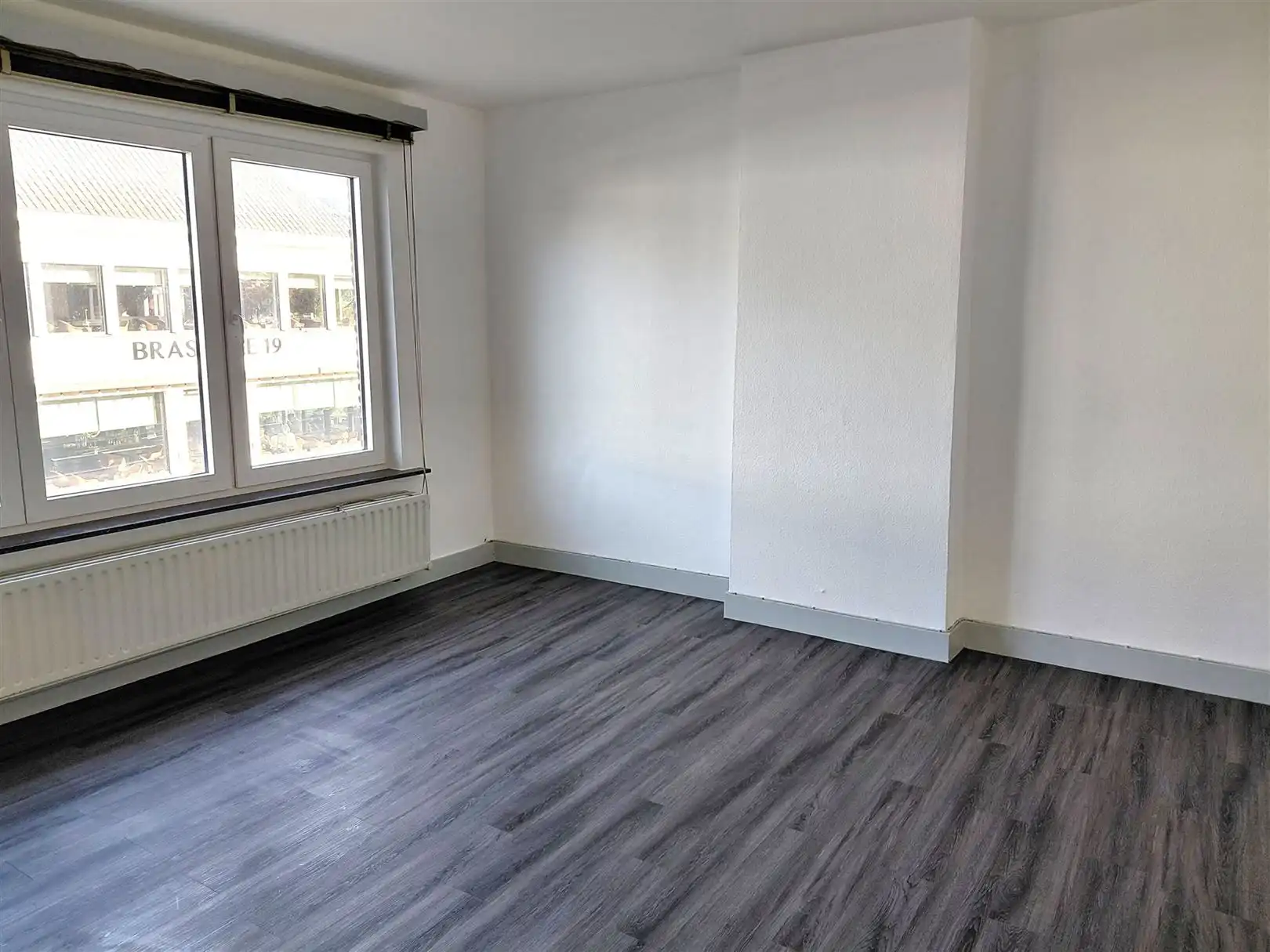 TE HUUR: Gesloten bebouwing met 2 slaapkamers in het centrum van Heusden! foto 16